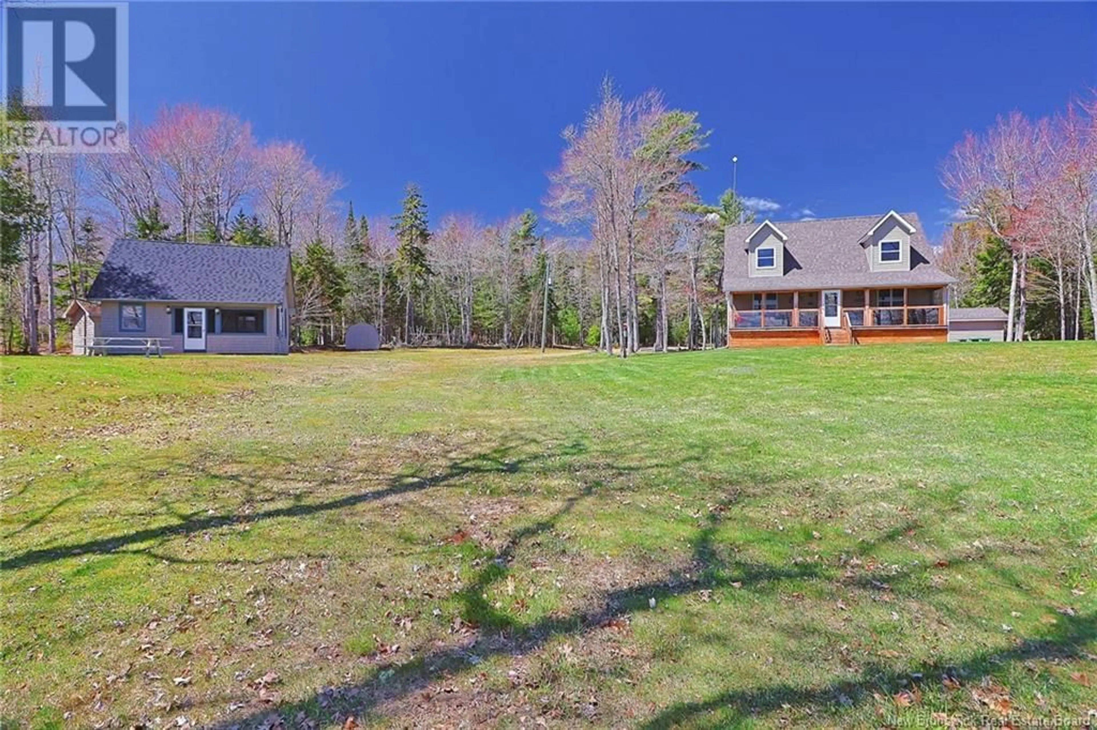 A pic from outside/outdoor area/front of a property/back of a property/a pic from drone, water/lake/river/ocean view for 1276 COX POINT ROAD, Cumberland Bay New Brunswick E4A2Z3