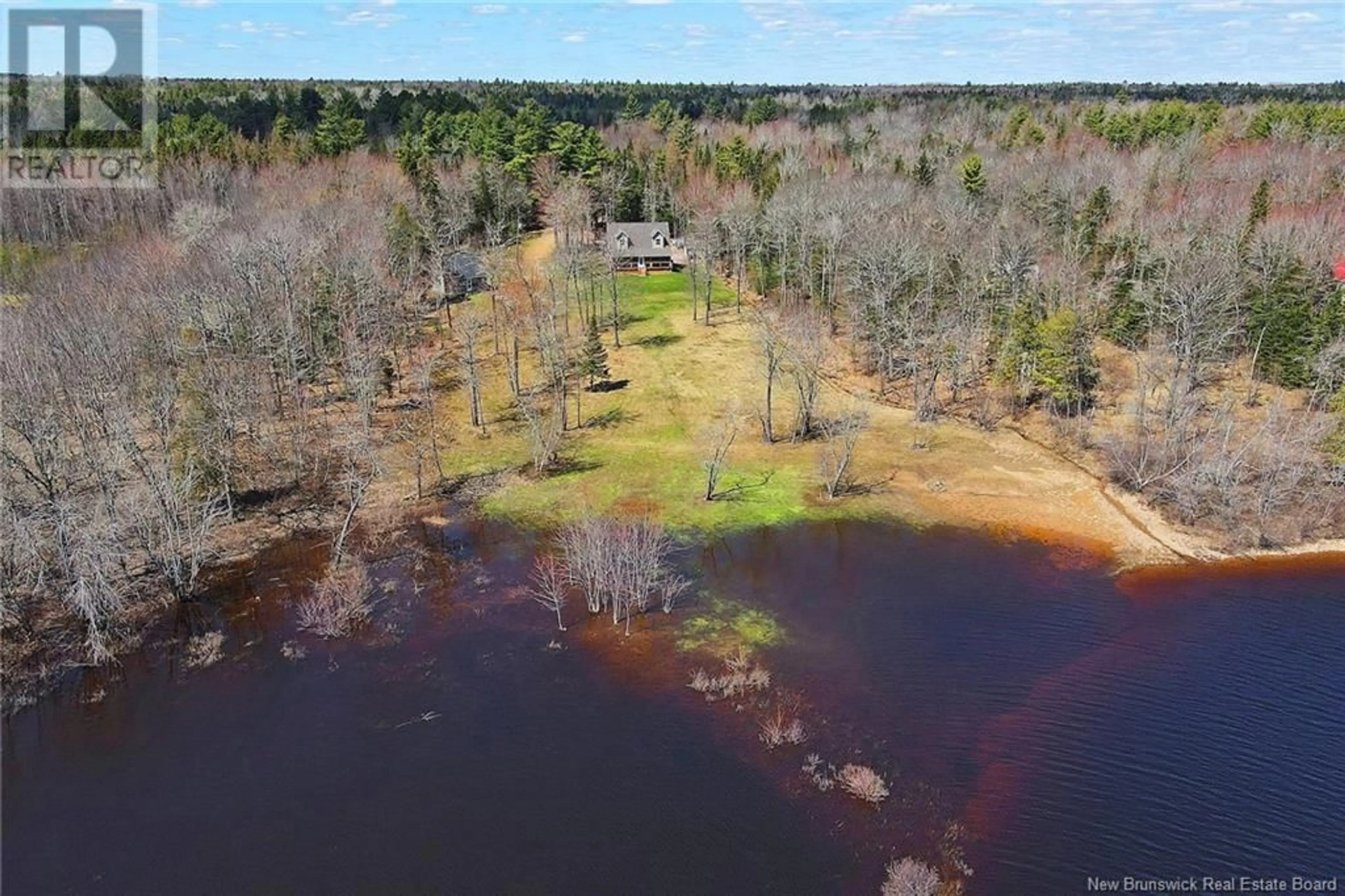 A pic from outside/outdoor area/front of a property/back of a property/a pic from drone, water/lake/river/ocean view for 1276 COX POINT ROAD, Cumberland Bay New Brunswick E4A2Z3