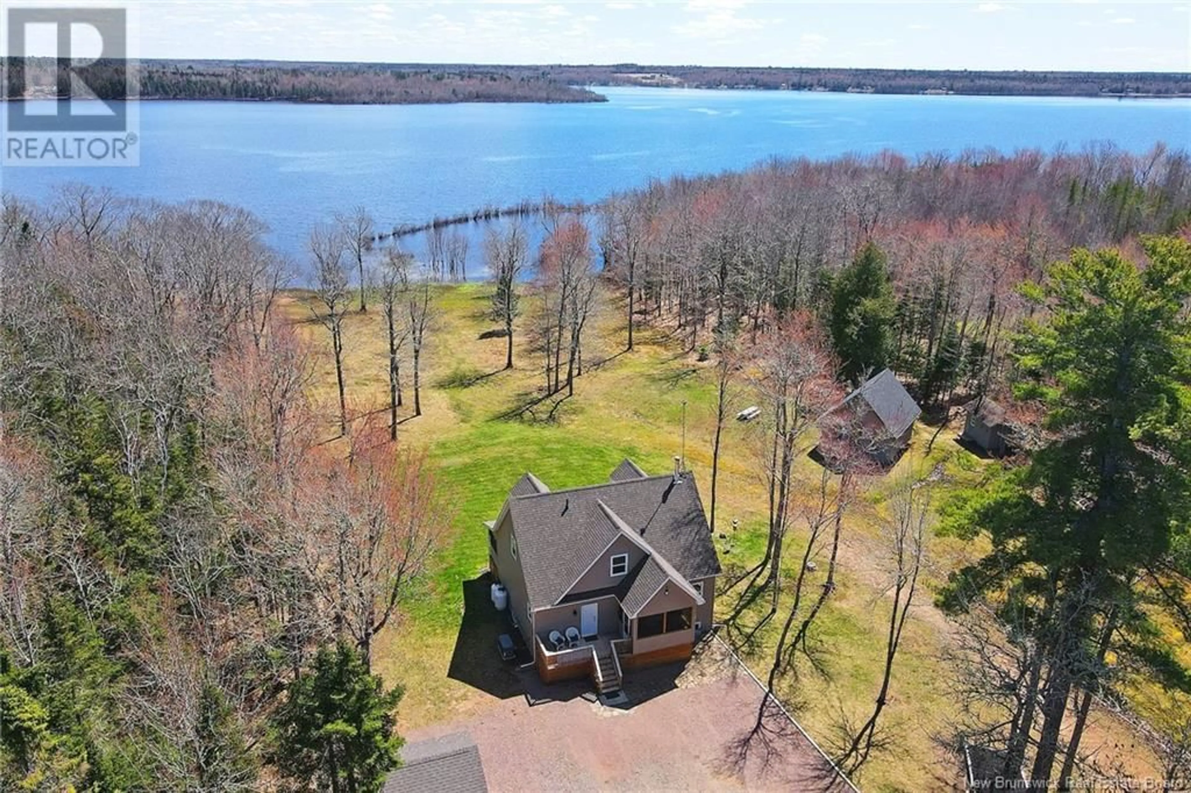 A pic from outside/outdoor area/front of a property/back of a property/a pic from drone, water/lake/river/ocean view for 1276 COX POINT ROAD, Cumberland Bay New Brunswick E4A2Z3
