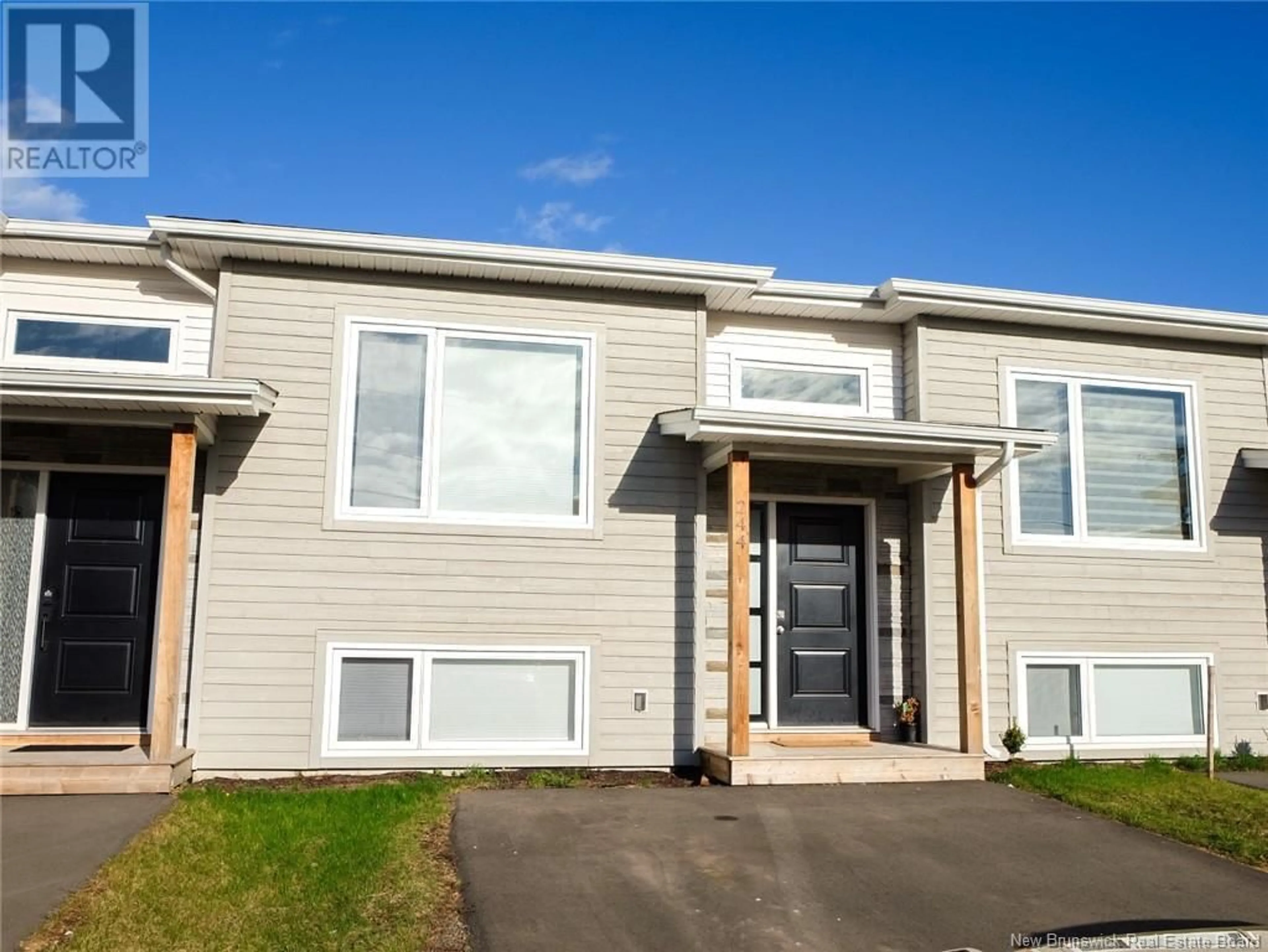 Home with vinyl exterior material, street for 244 FALCON, Moncton New Brunswick E1G6H1