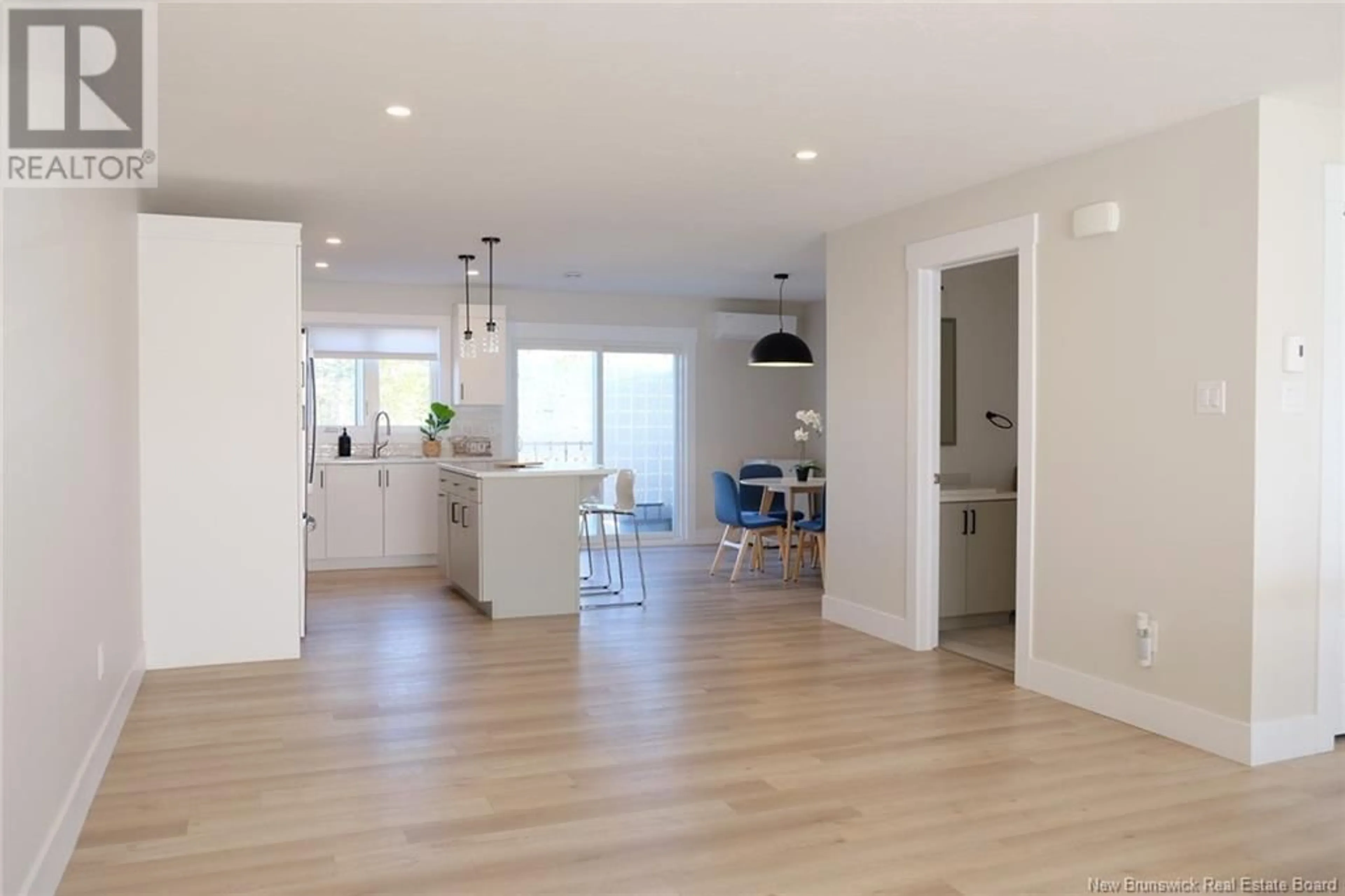 Open concept kitchen, wood/laminate floor for 244 FALCON, Moncton New Brunswick E1G6H1