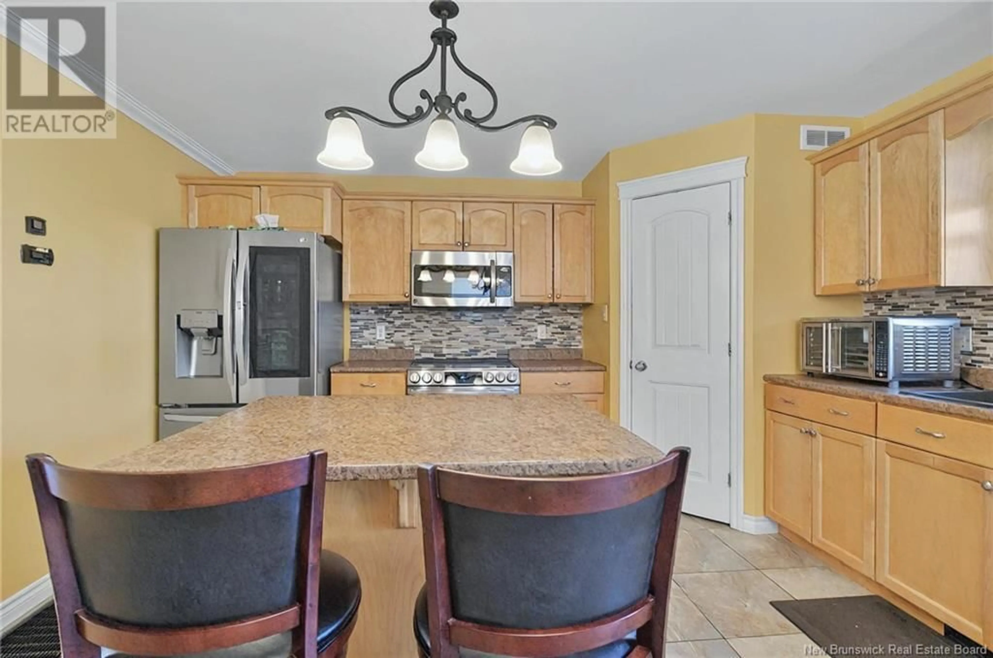 Open concept kitchen, ceramic/tile floor for 464 EVERGREEN DRIVE, Moncton New Brunswick E1G0B3