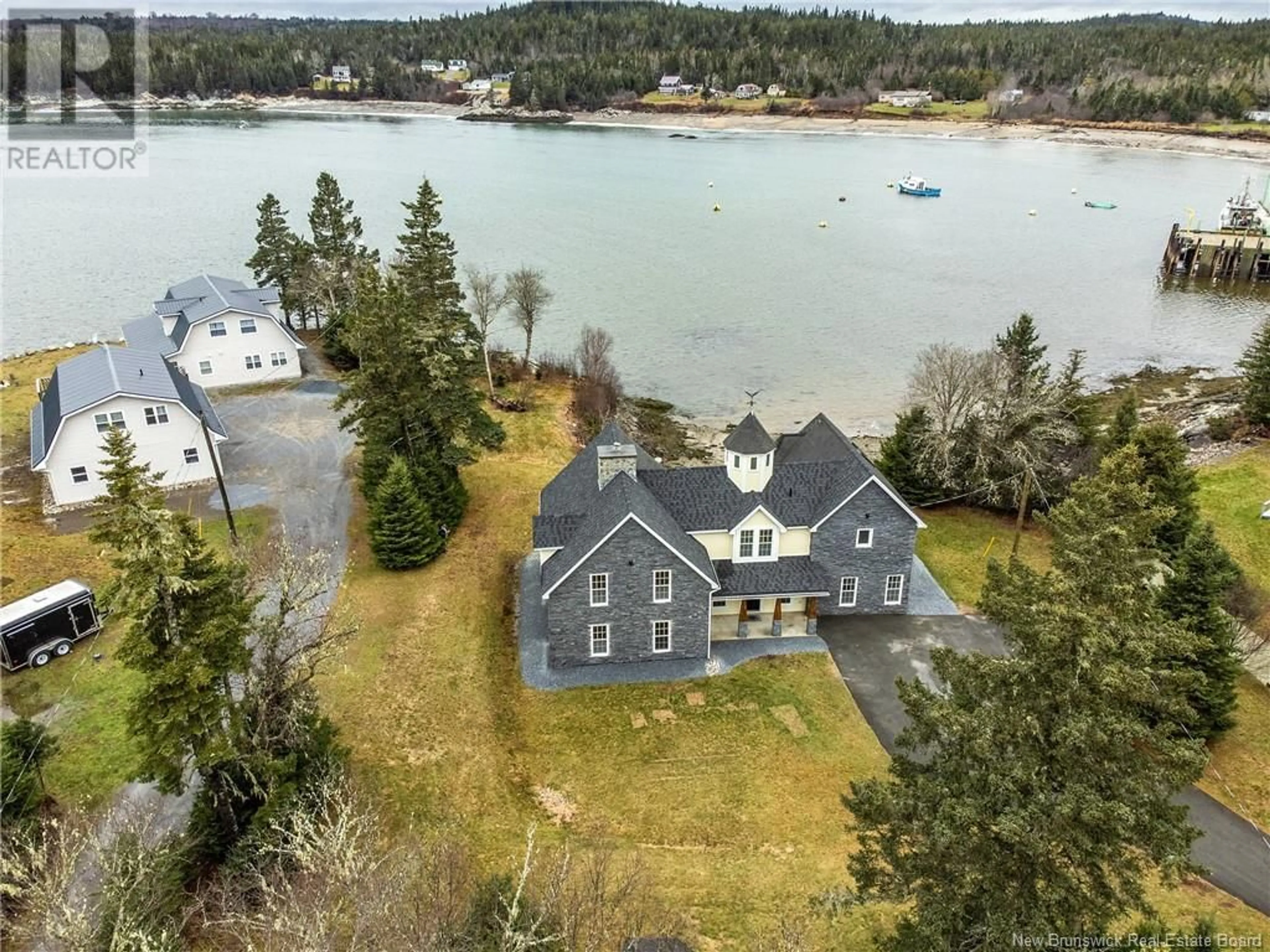 A pic from outside/outdoor area/front of a property/back of a property/a pic from drone, water/lake/river/ocean view for 76 HOLLAND ROAD, Seeleys Cove New Brunswick E5H2G4