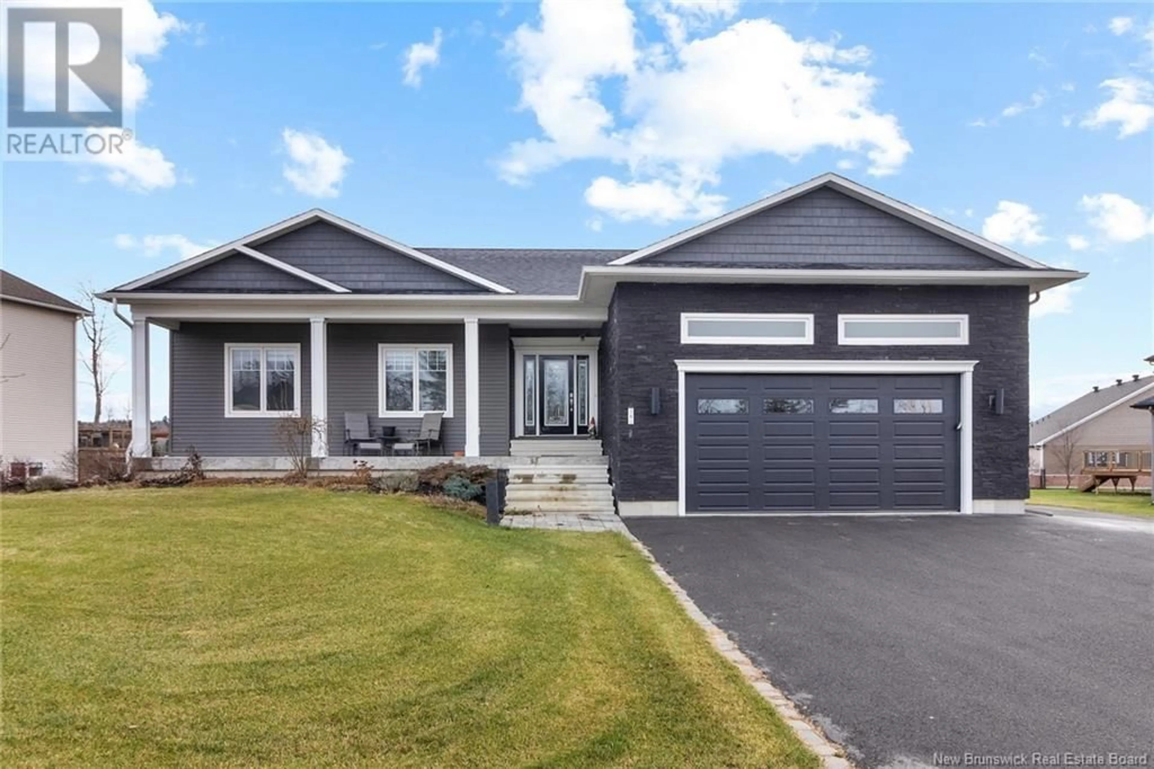 Home with vinyl exterior material, street for 38 STONEHILL LANE, Fredericton New Brunswick E3G0E9