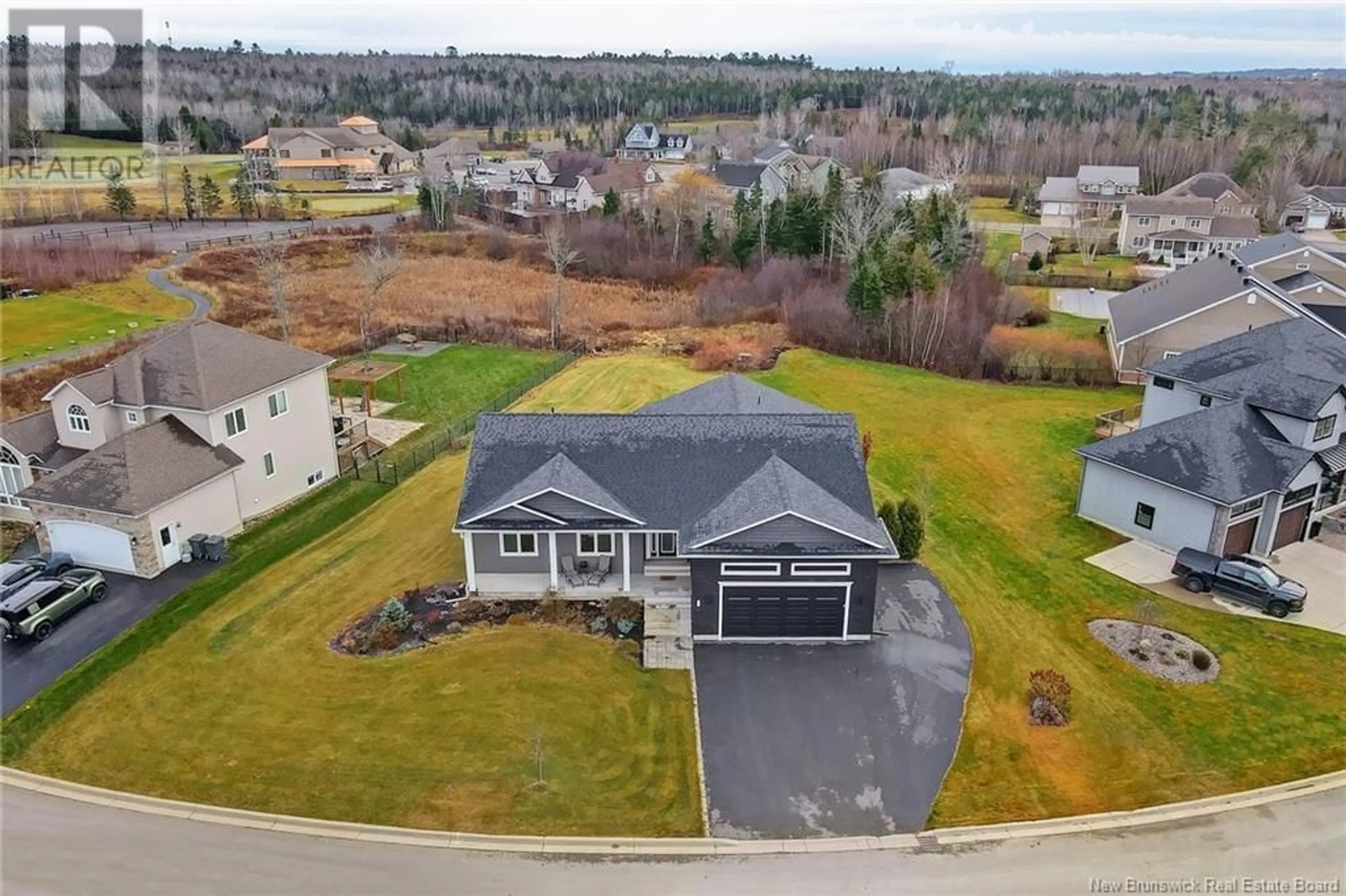 A pic from outside/outdoor area/front of a property/back of a property/a pic from drone, unknown for 38 STONEHILL LANE, Fredericton New Brunswick E3G0E9