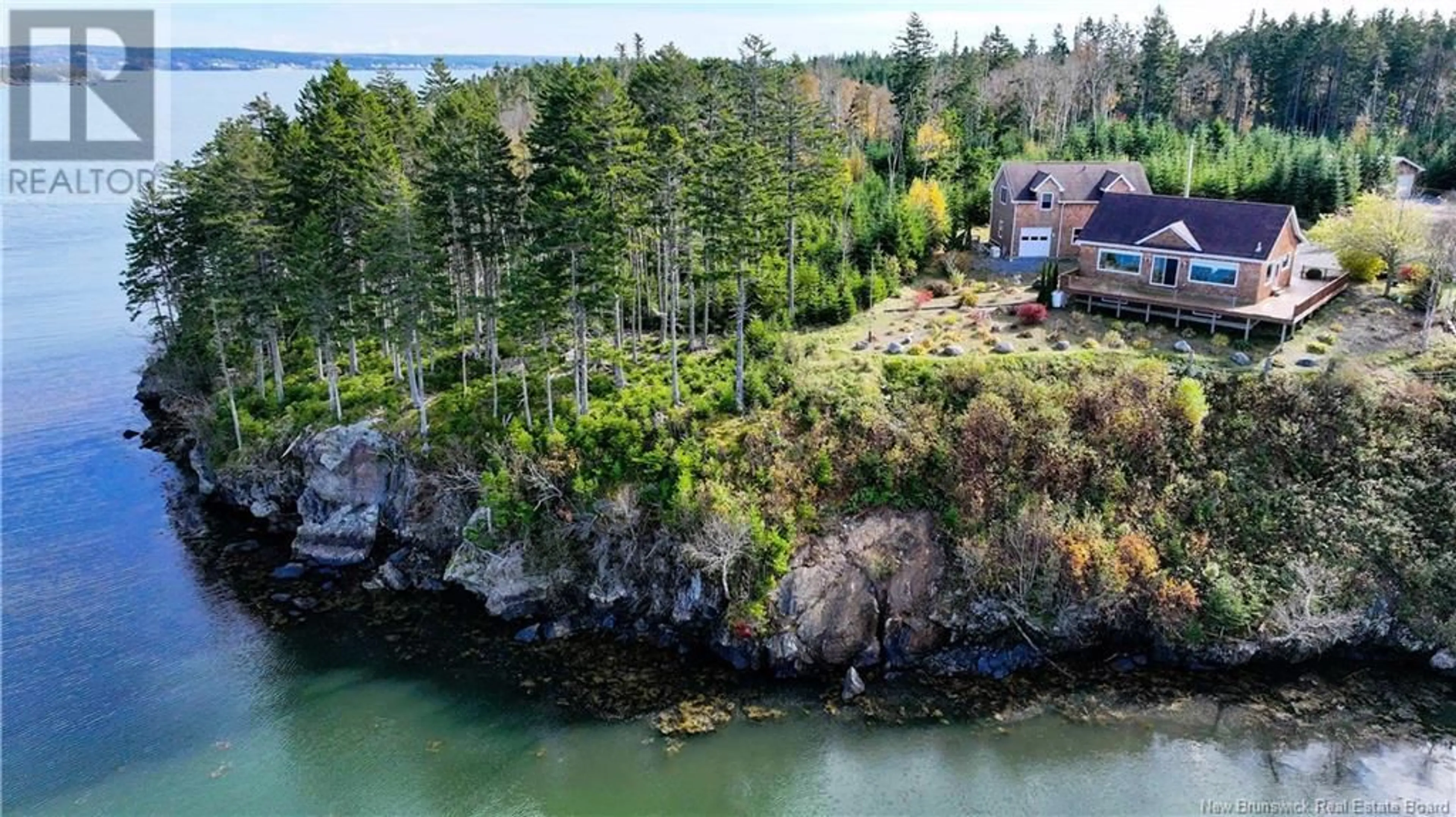 A pic from outside/outdoor area/front of a property/back of a property/a pic from drone, water/lake/river/ocean view for 87 HAGGERTYS COVE ROAD, New River Beach New Brunswick E5J1J9