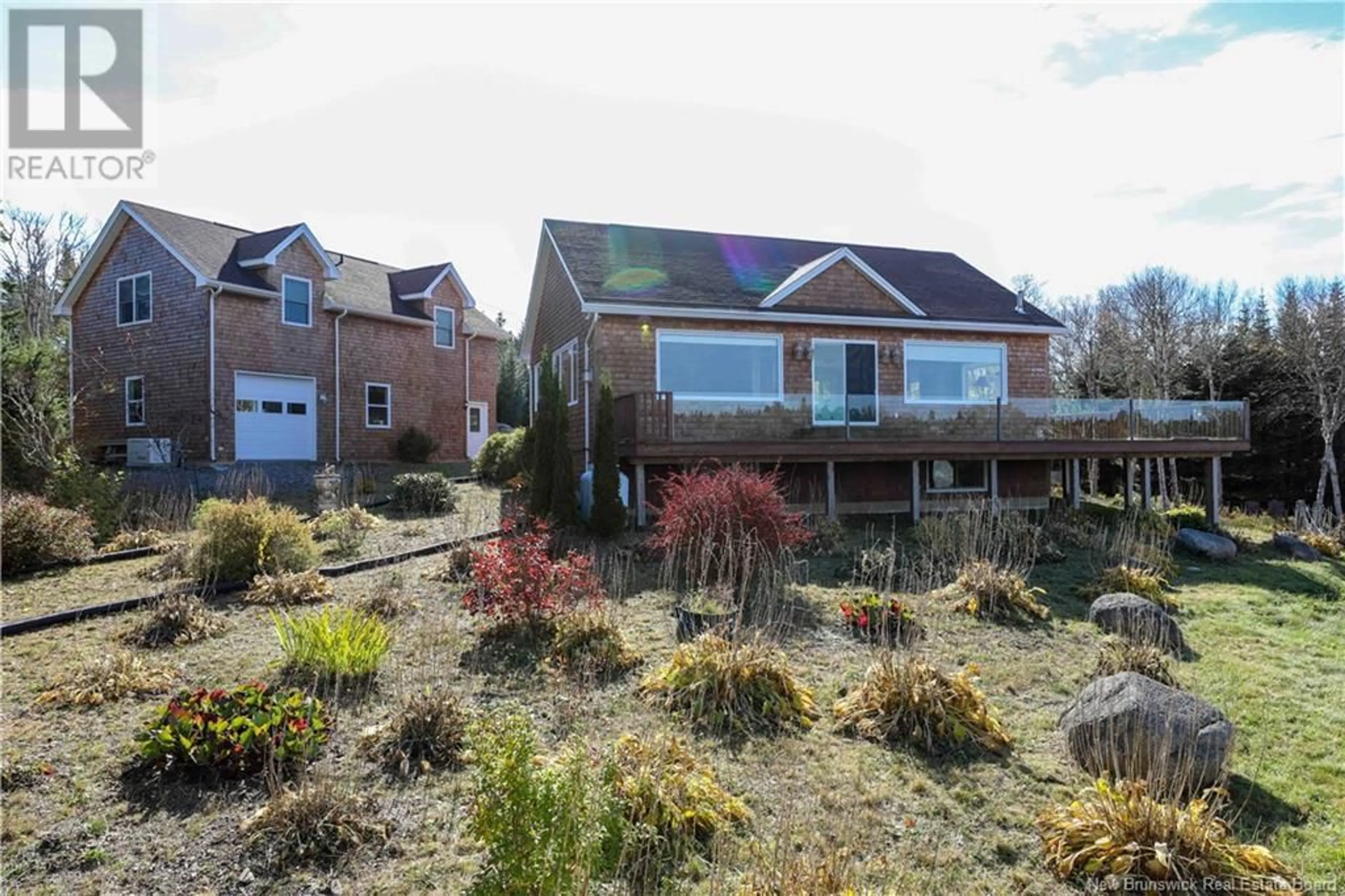 A pic from outside/outdoor area/front of a property/back of a property/a pic from drone, unknown for 87 HAGGERTYS COVE ROAD, New River Beach New Brunswick E5J1J9