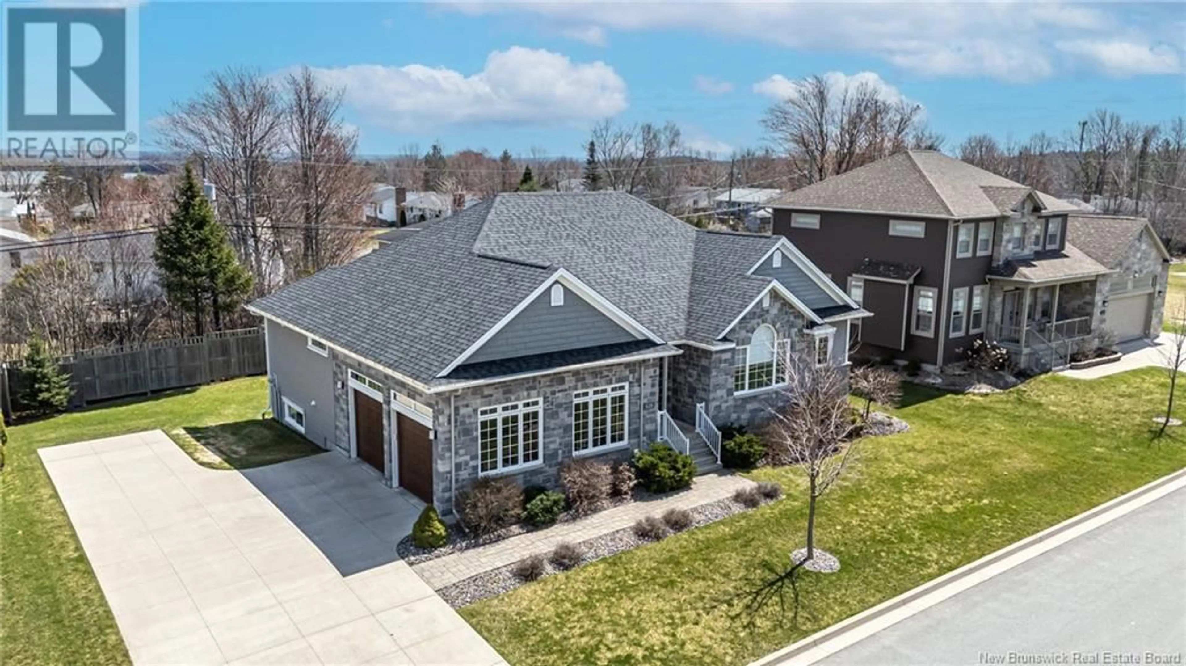 A pic from outside/outdoor area/front of a property/back of a property/a pic from drone, street for 625 WETMORE ROAD, Fredericton New Brunswick E3B0W6