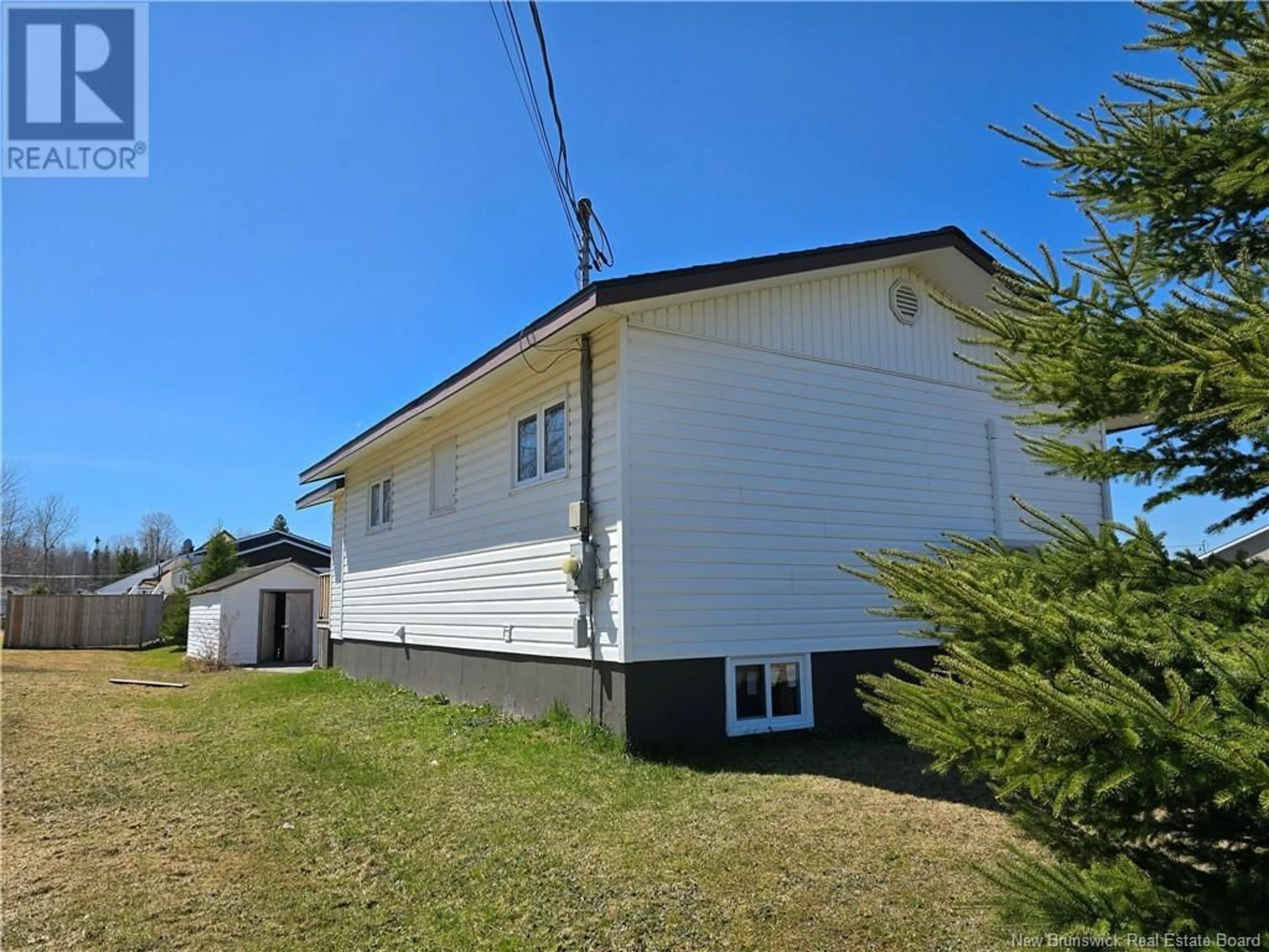 A pic from outside/outdoor area/front of a property/back of a property/a pic from drone, unknown for 936 PRINCIPALE, Beresford New Brunswick E8K2H5