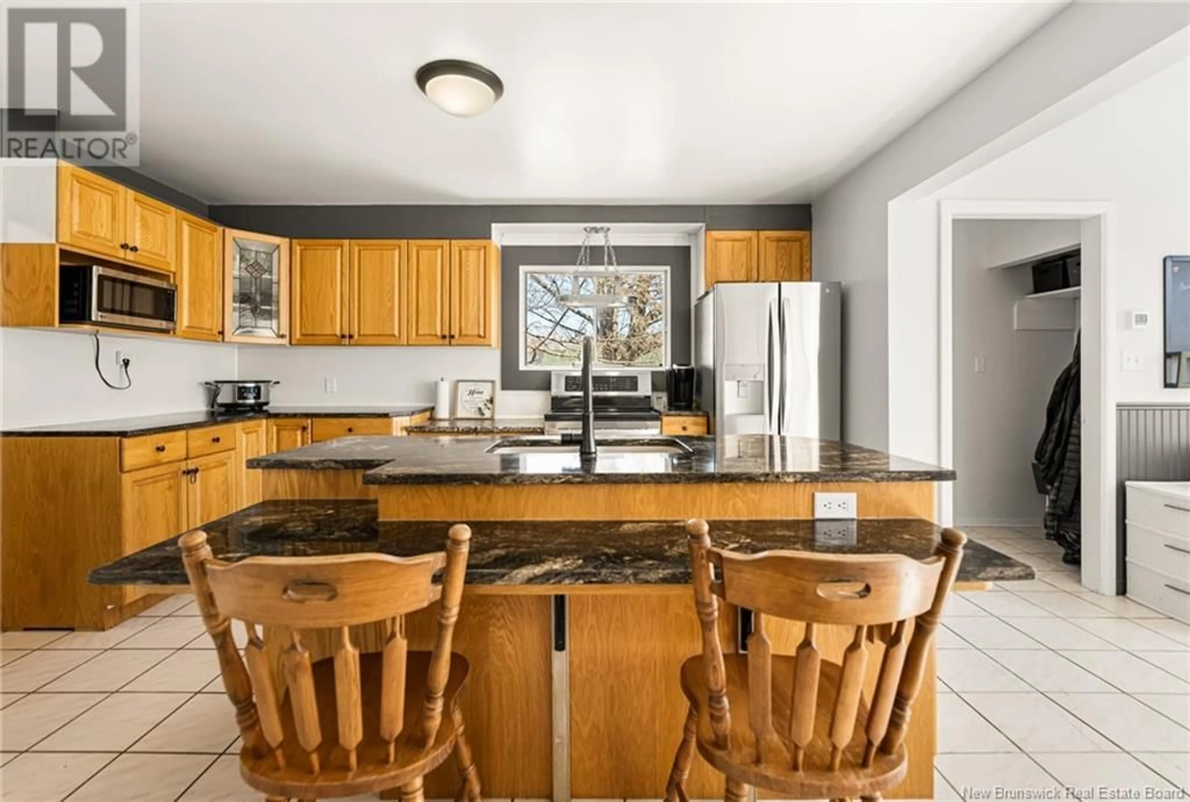 Open concept kitchen, ceramic/tile floor for 36 TIPPERARY STREET, Shediac New Brunswick E4P2V8