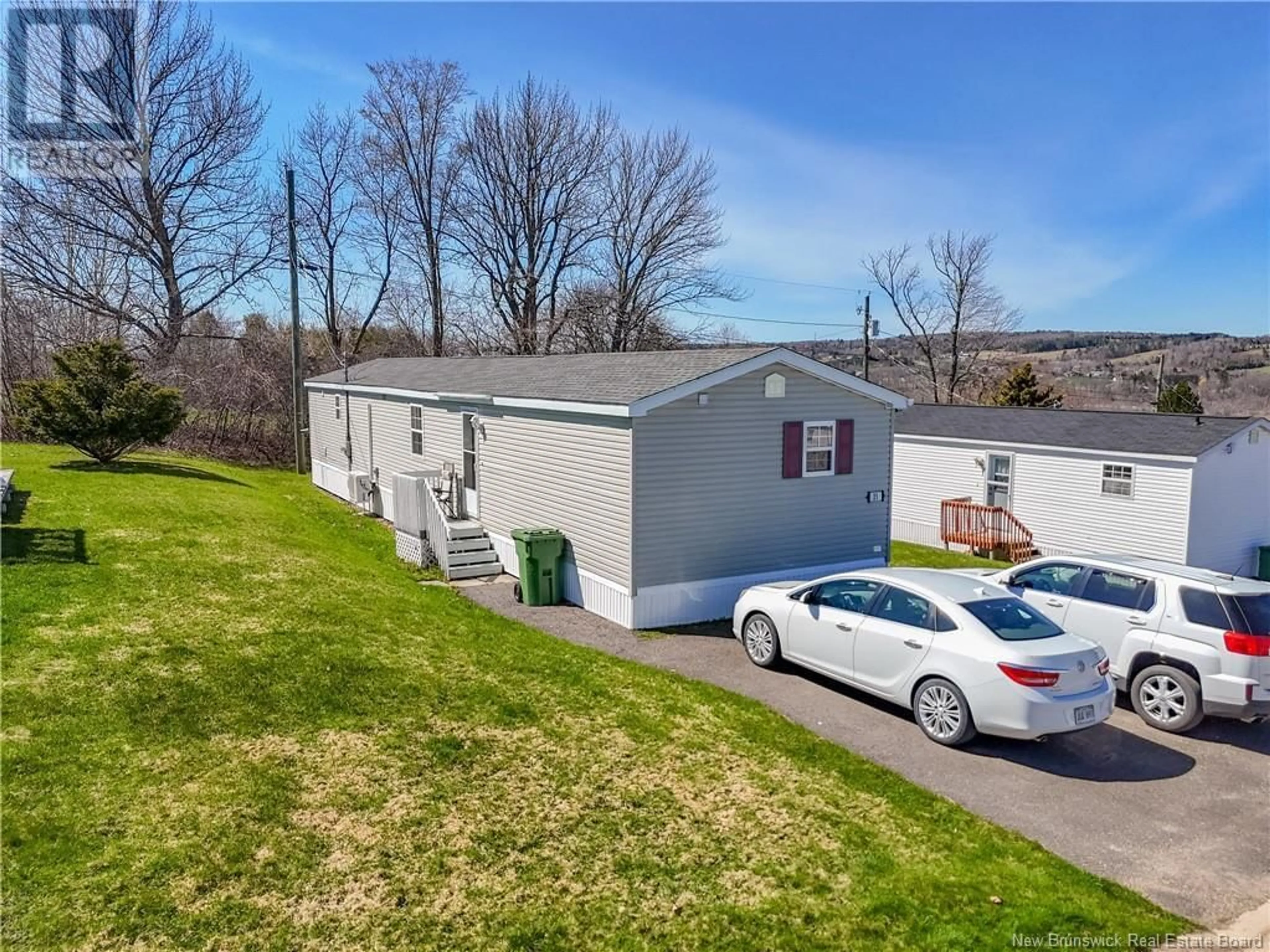 A pic from outside/outdoor area/front of a property/back of a property/a pic from drone, unknown for 23 TODD STREET, Fredericton New Brunswick E3C2M9