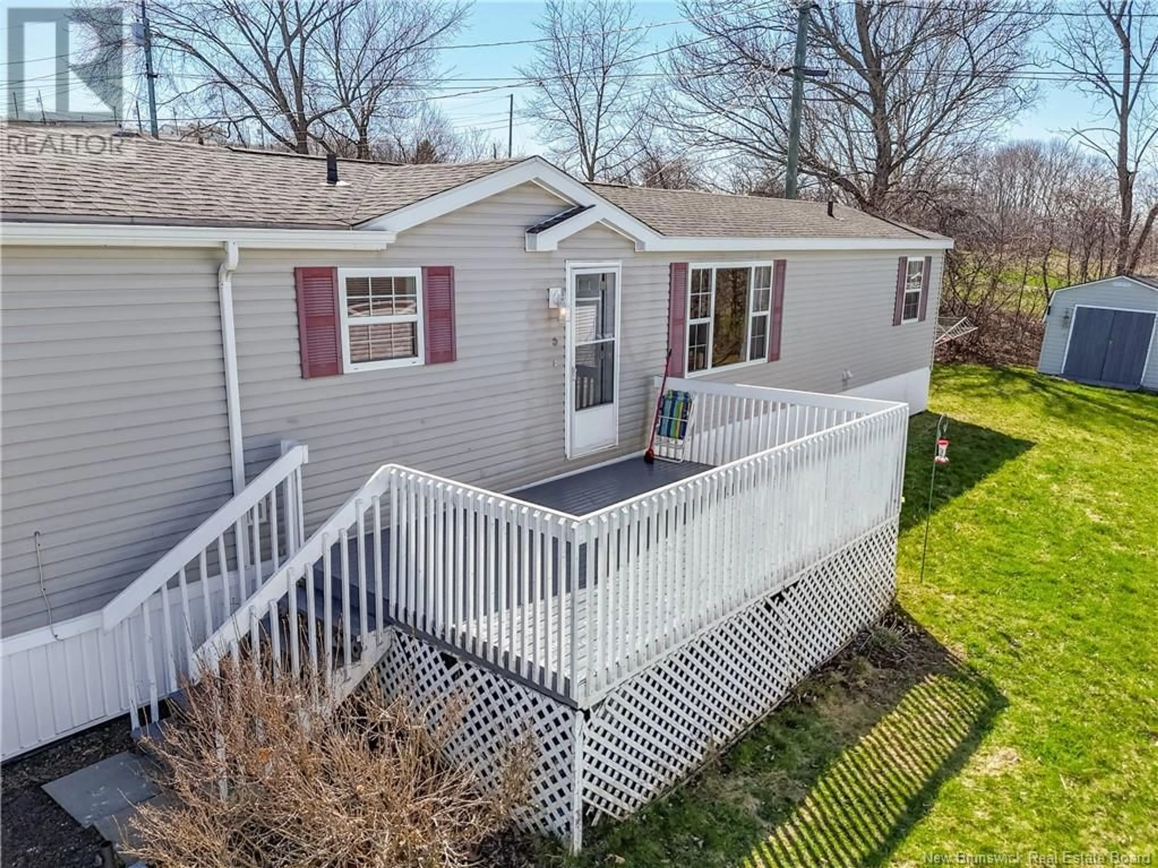 A pic from outside/outdoor area/front of a property/back of a property/a pic from drone, street for 23 TODD STREET, Fredericton New Brunswick E3C2M9