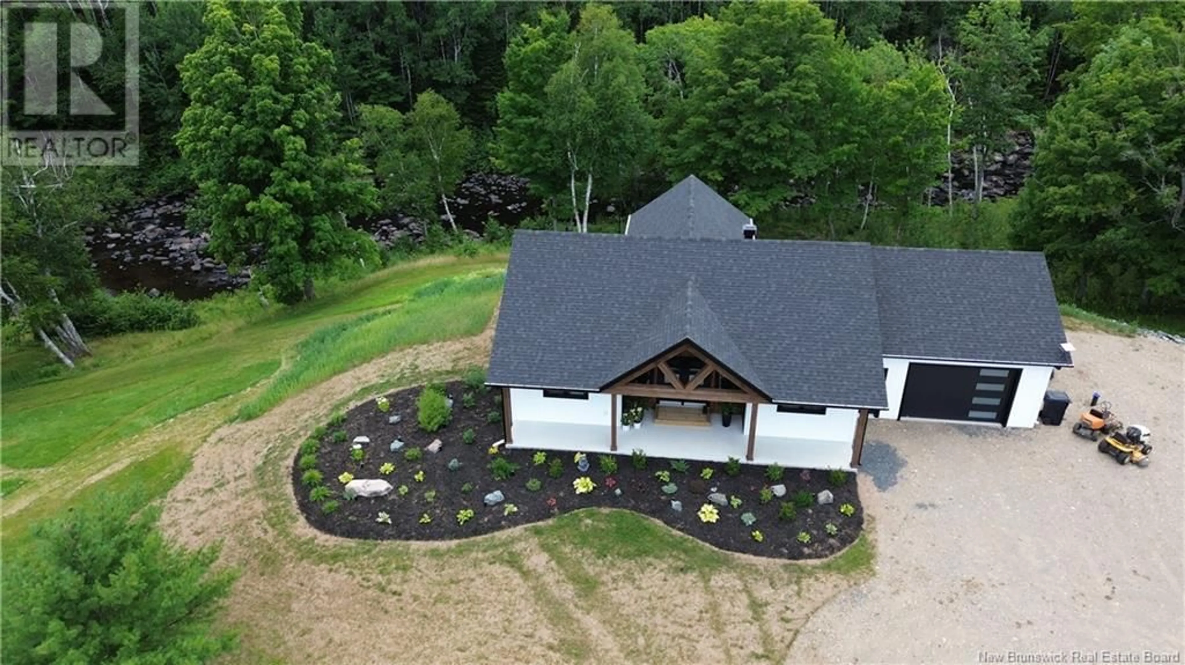 A pic from outside/outdoor area/front of a property/back of a property/a pic from drone, unknown for 1300 WEST DRIVE, Bathurst New Brunswick E2A0B4