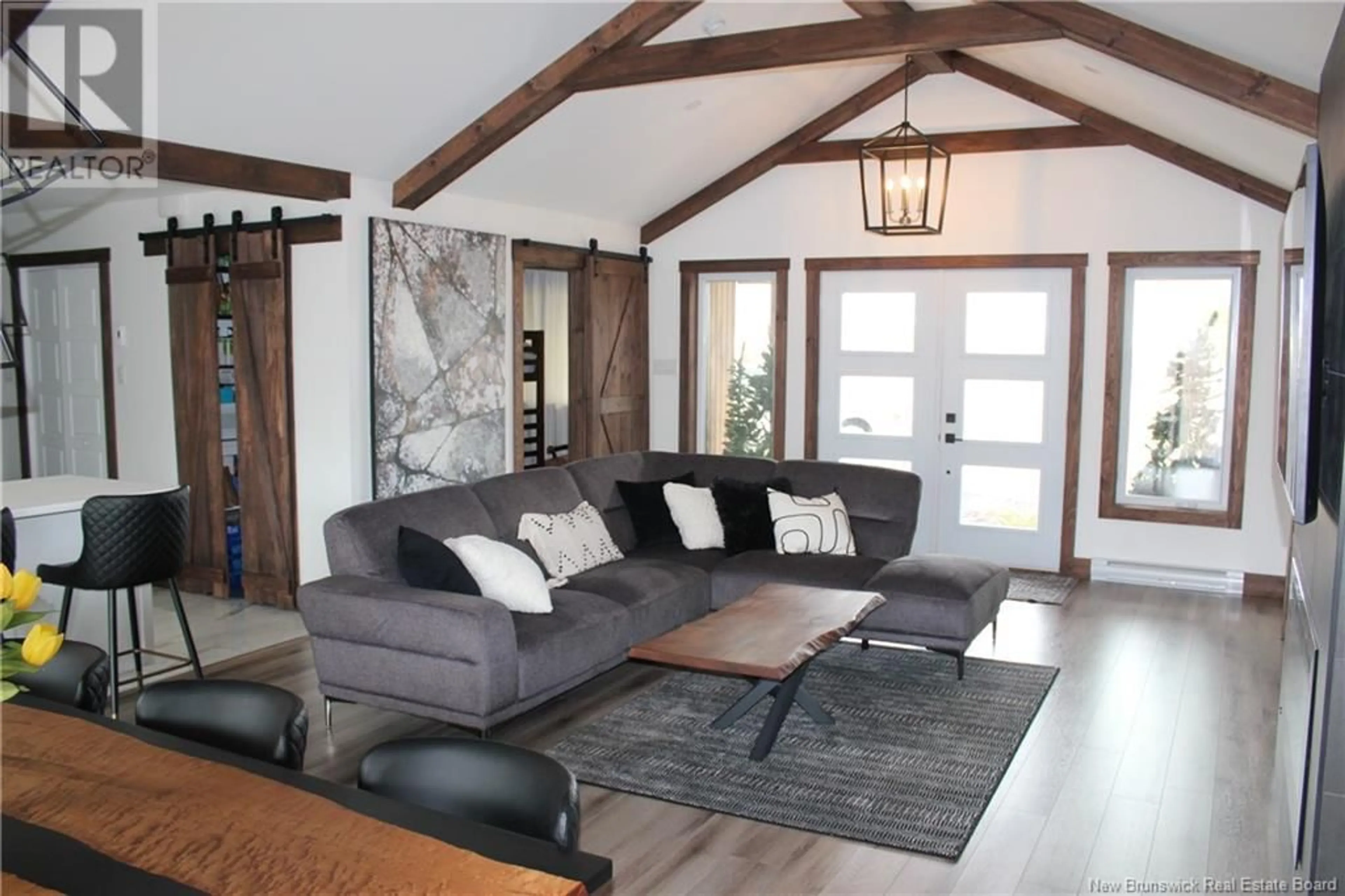 Living room with furniture, wood/laminate floor for 1300 WEST DRIVE, Bathurst New Brunswick E2A0B4