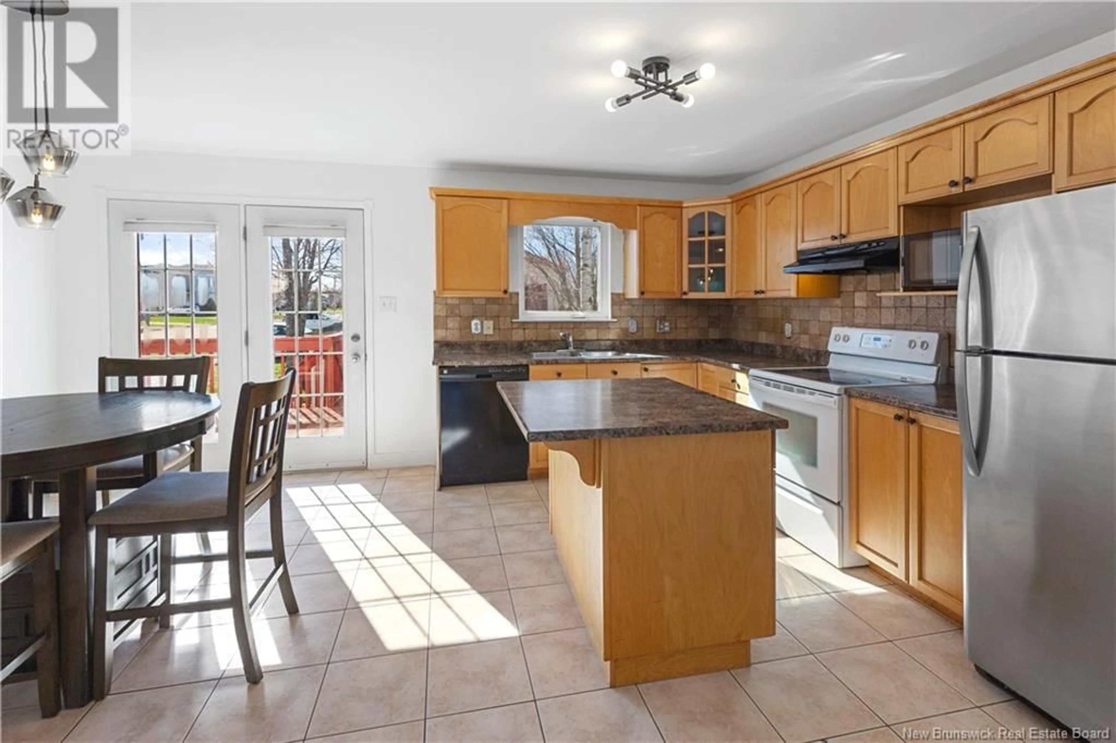 Open concept kitchen, ceramic/tile floor for 50 STONEHAM DRIVE, Moncton New Brunswick E1G4Z7