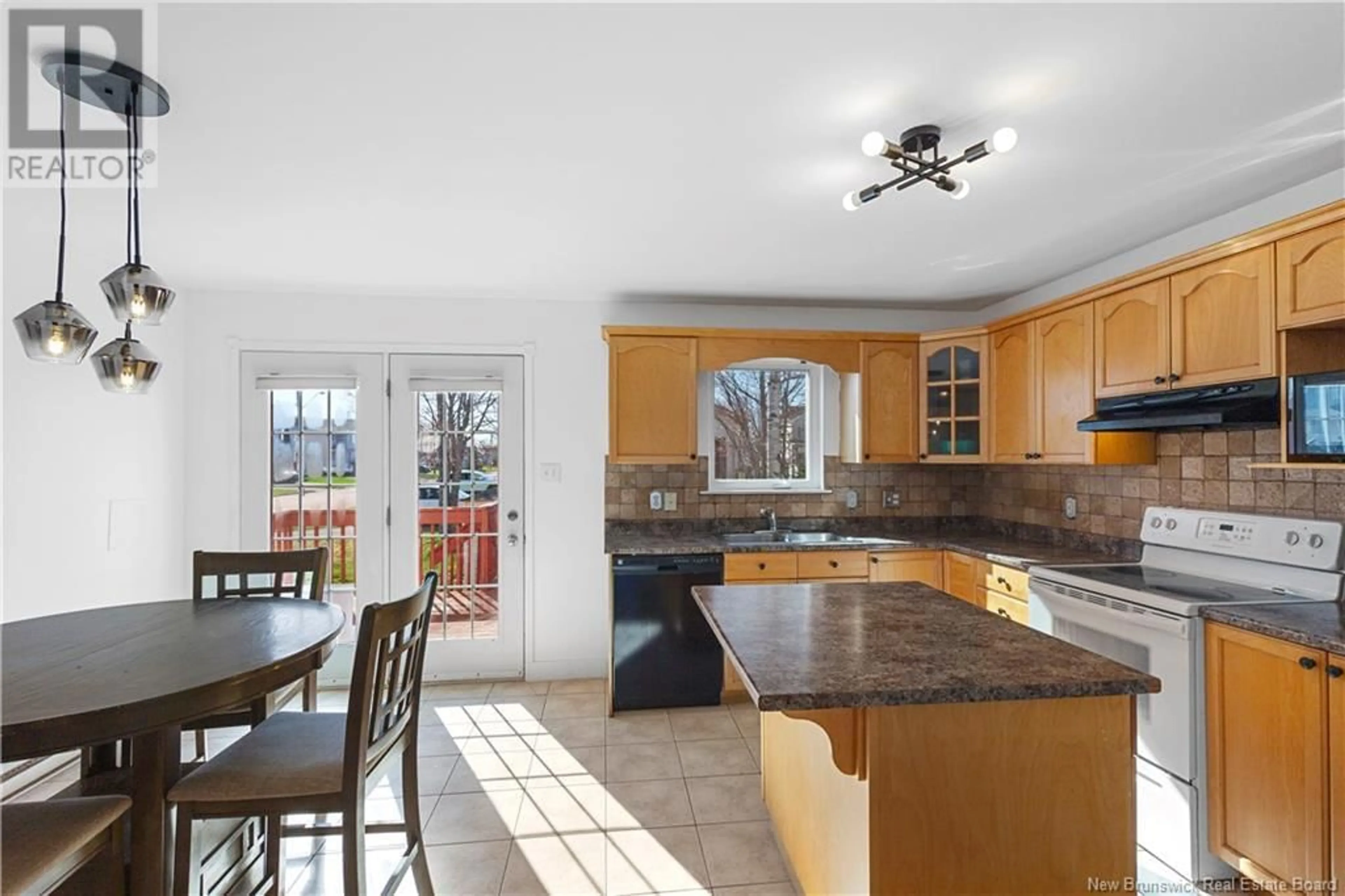 Open concept kitchen, ceramic/tile floor for 50 STONEHAM DRIVE, Moncton New Brunswick E1G4Z7