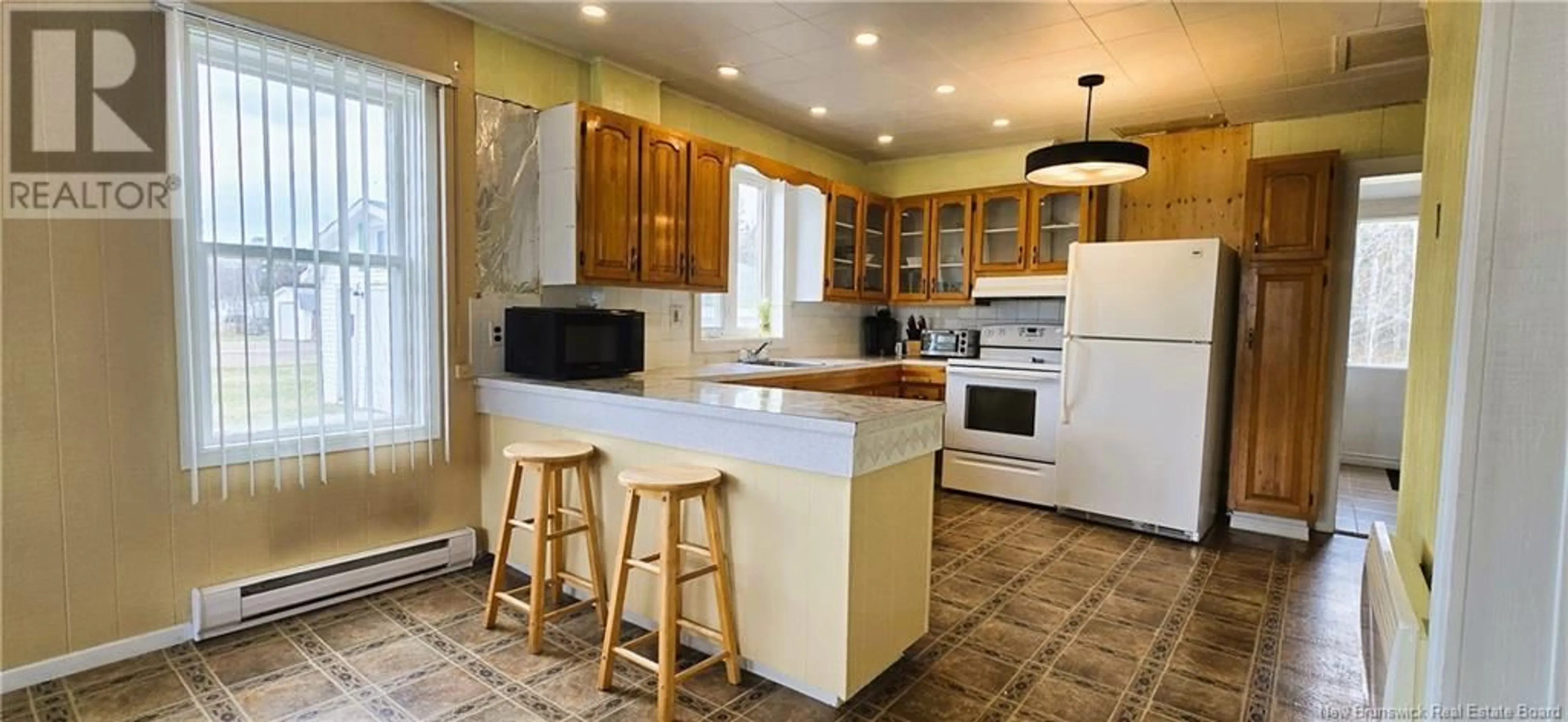 Open concept kitchen, ceramic/tile floor for 754 RUE PINET STREET, Bertrand New Brunswick E1W1L6