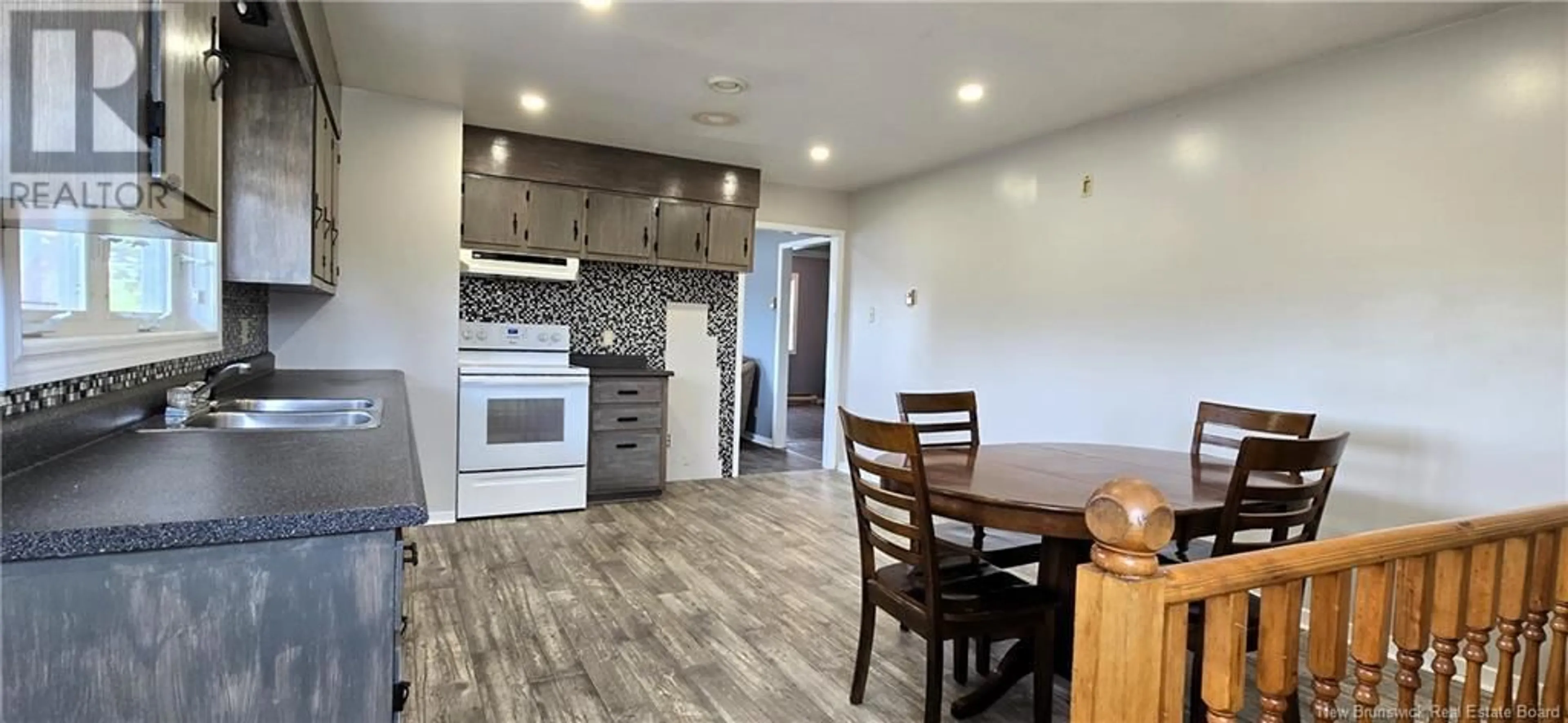 Open concept kitchen, wood/laminate floor for 3 RUE LOUIS SUD, Neguac New Brunswick E9G1K8