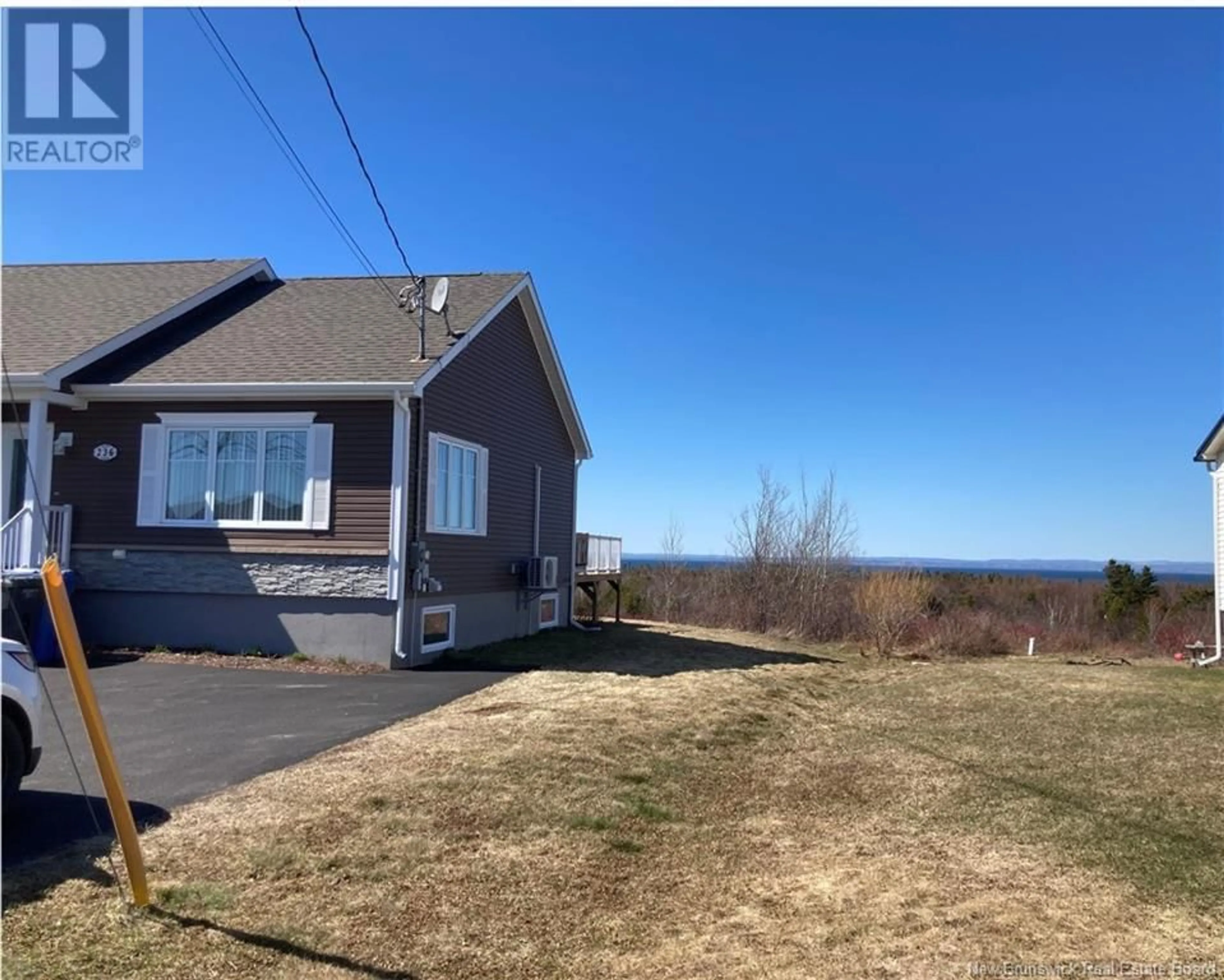 A pic from outside/outdoor area/front of a property/back of a property/a pic from drone, water/lake/river/ocean view for 236 RUE ACADIE STREET, Grande-Anse New Brunswick E8N1B3