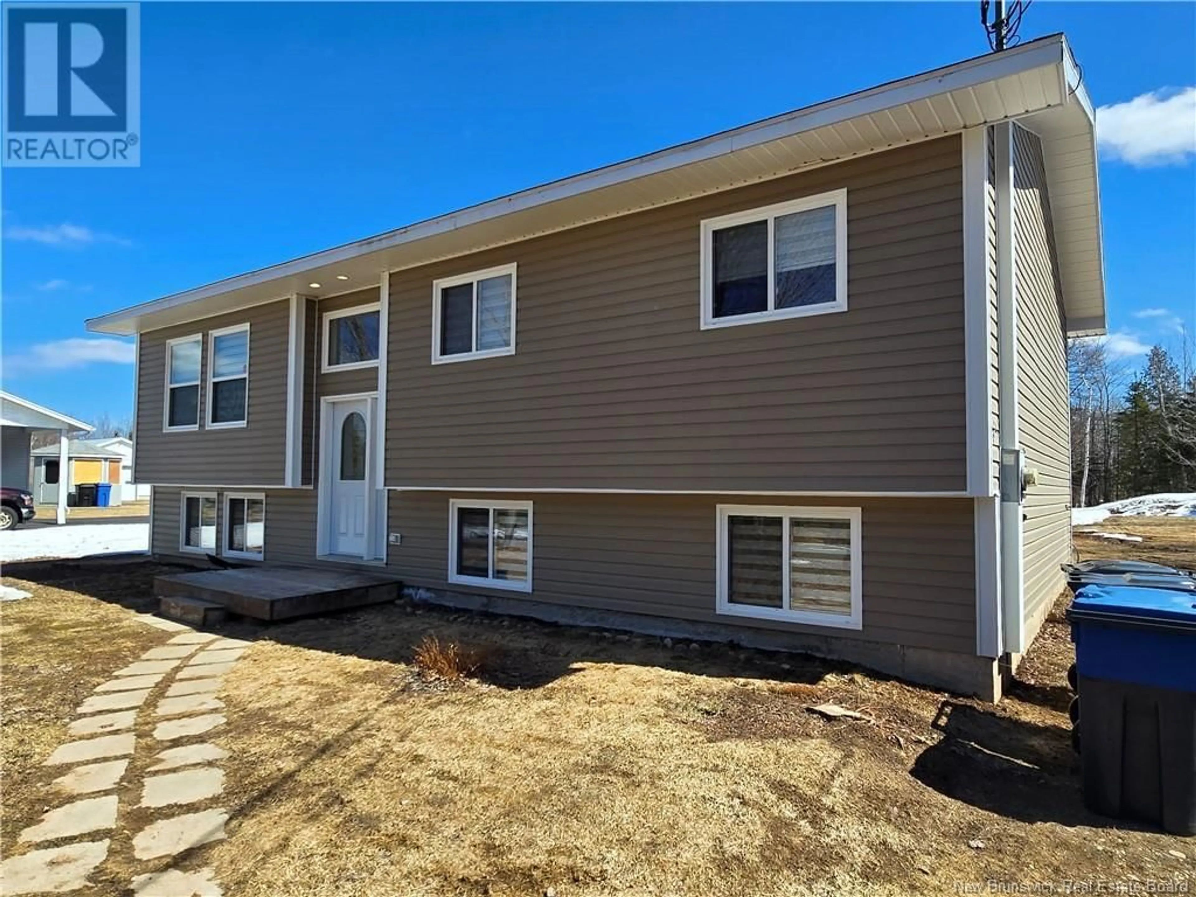 Home with vinyl exterior material, street for 1096 PACKARD STREET, Bathurst New Brunswick E2A6J2