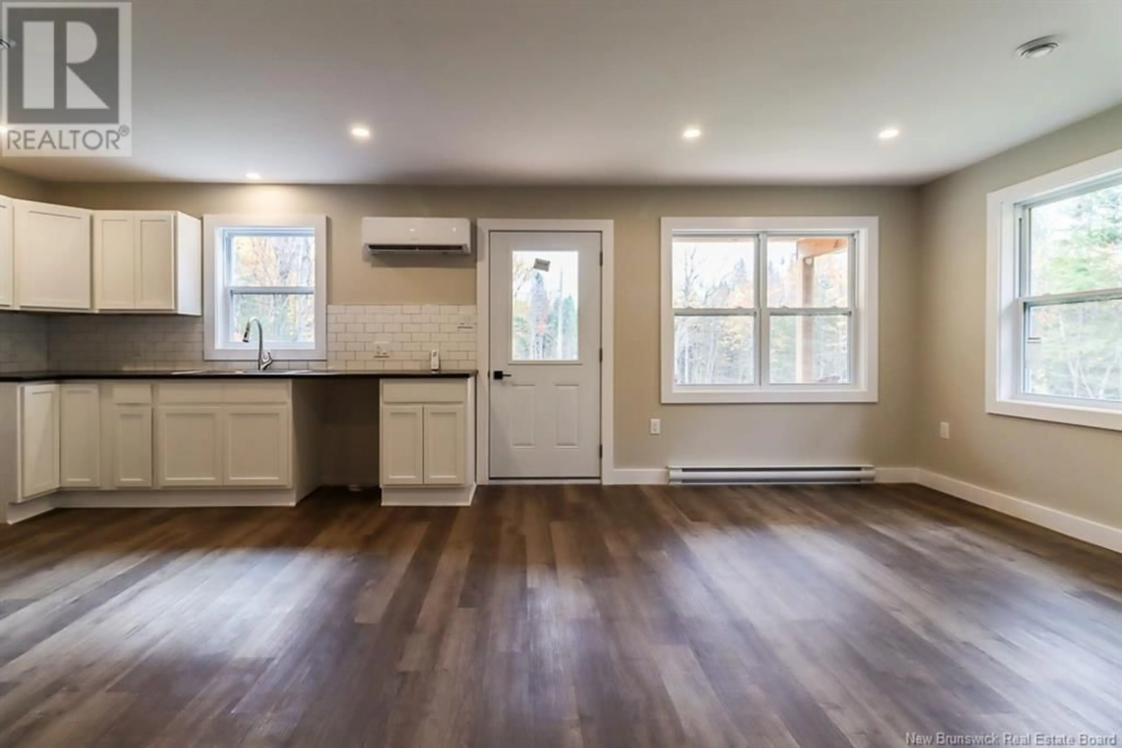 Open concept kitchen, wood/laminate floor for 298 KETCHUM ROAD, Kingston New Brunswick E5N1S3