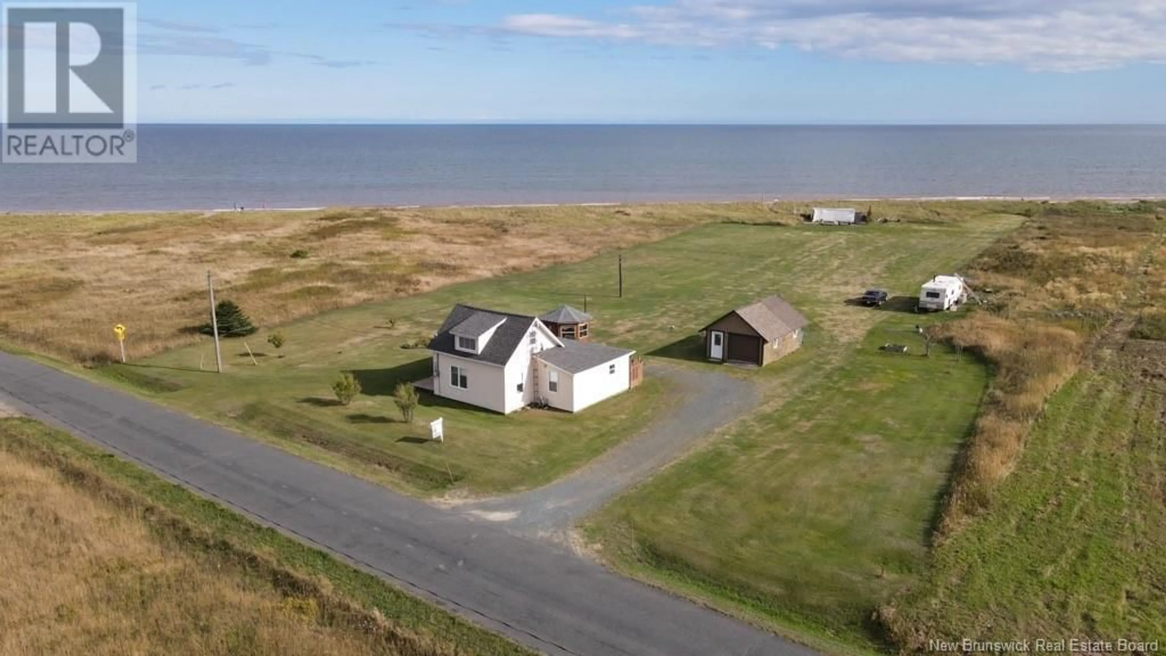 A pic from outside/outdoor area/front of a property/back of a property/a pic from drone, unknown for 1645 CH. WILSON POINT, Miscou New Brunswick E8T2G8