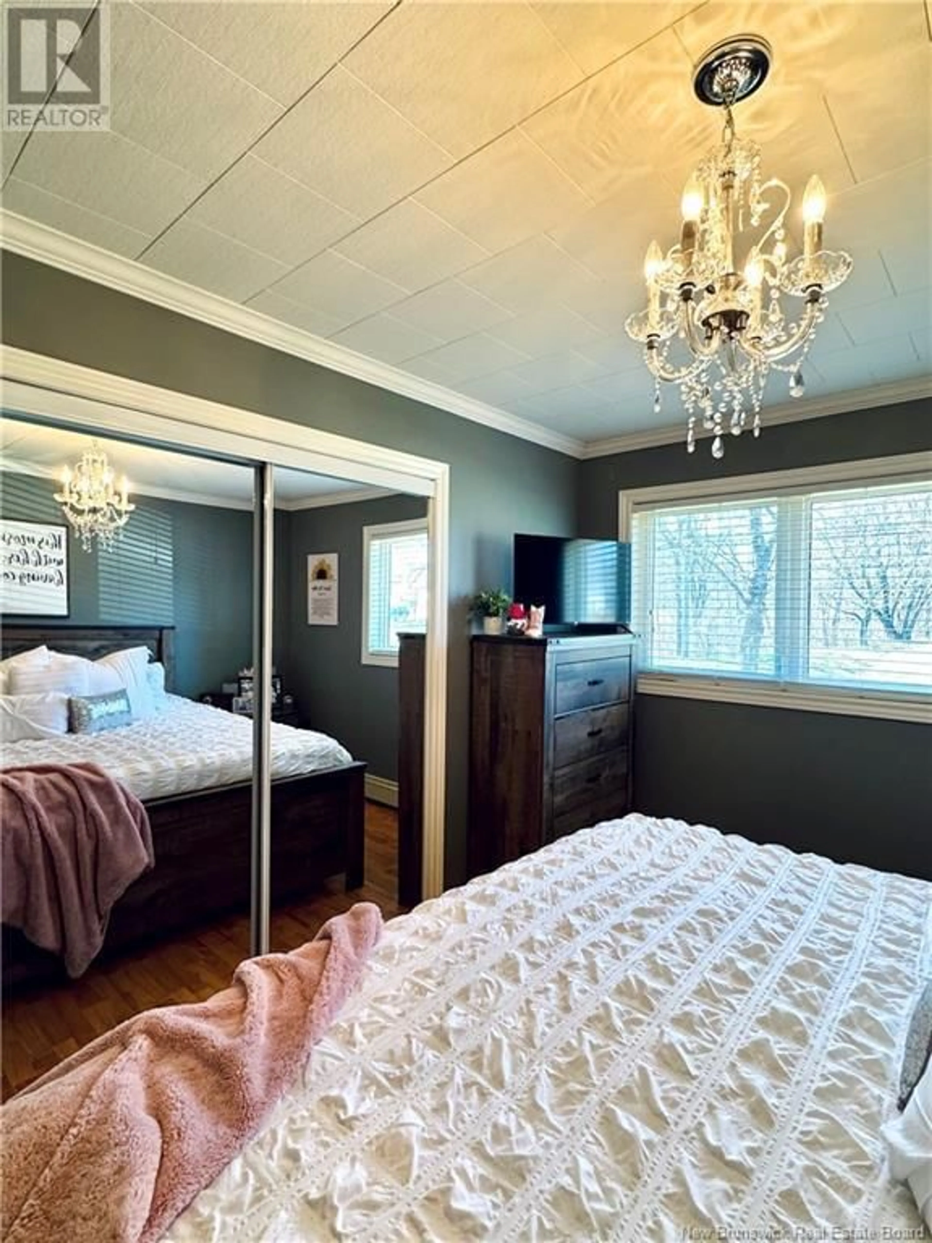 Bedroom with bed, wood/laminate floor for 302 KING GEORGE HWY, Miramichi New Brunswick E1V1K9