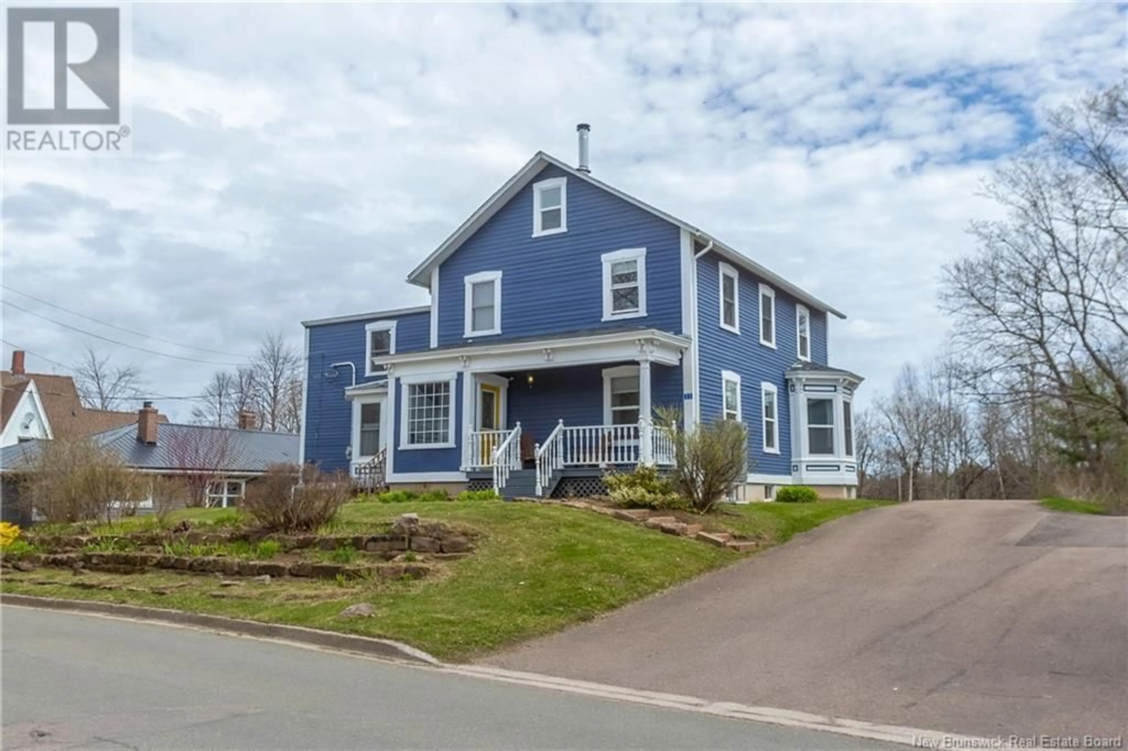Home with vinyl exterior material, street for 11 SQUIRE STREET, Sackville New Brunswick E4L4K8
