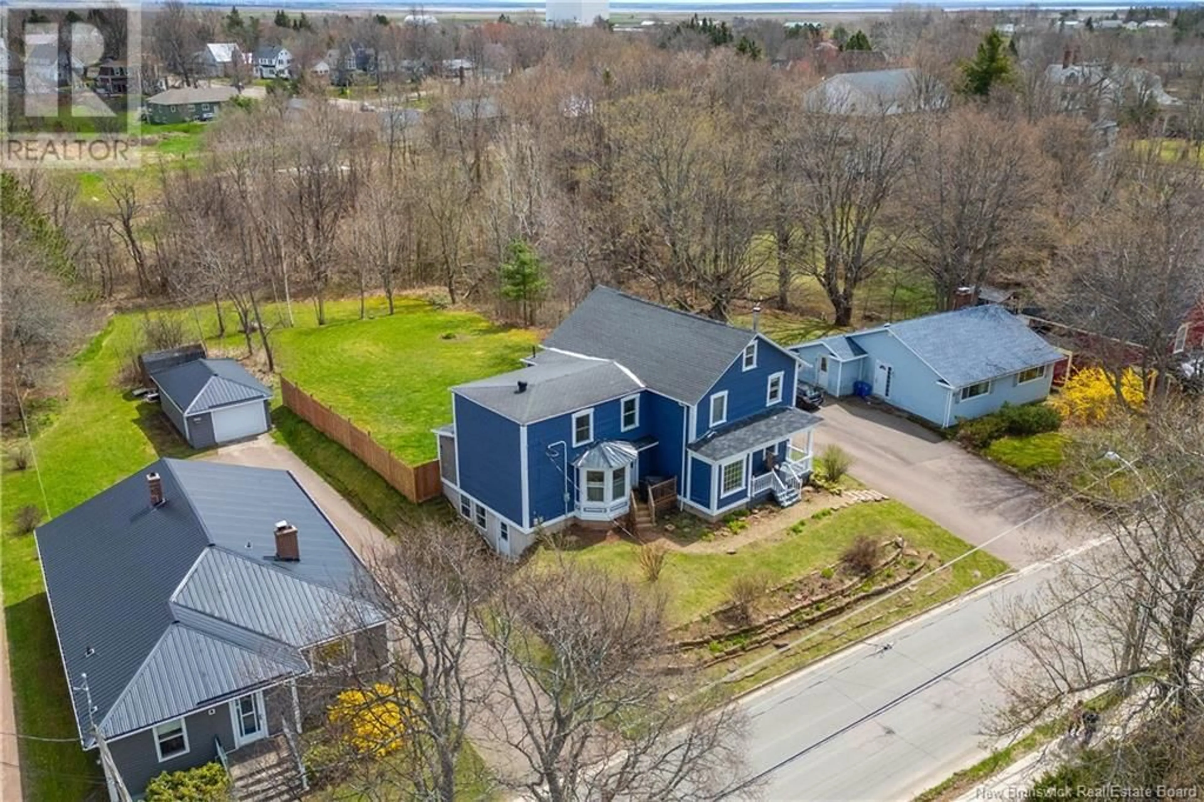 A pic from outside/outdoor area/front of a property/back of a property/a pic from drone, street for 11 SQUIRE STREET, Sackville New Brunswick E4L4K8