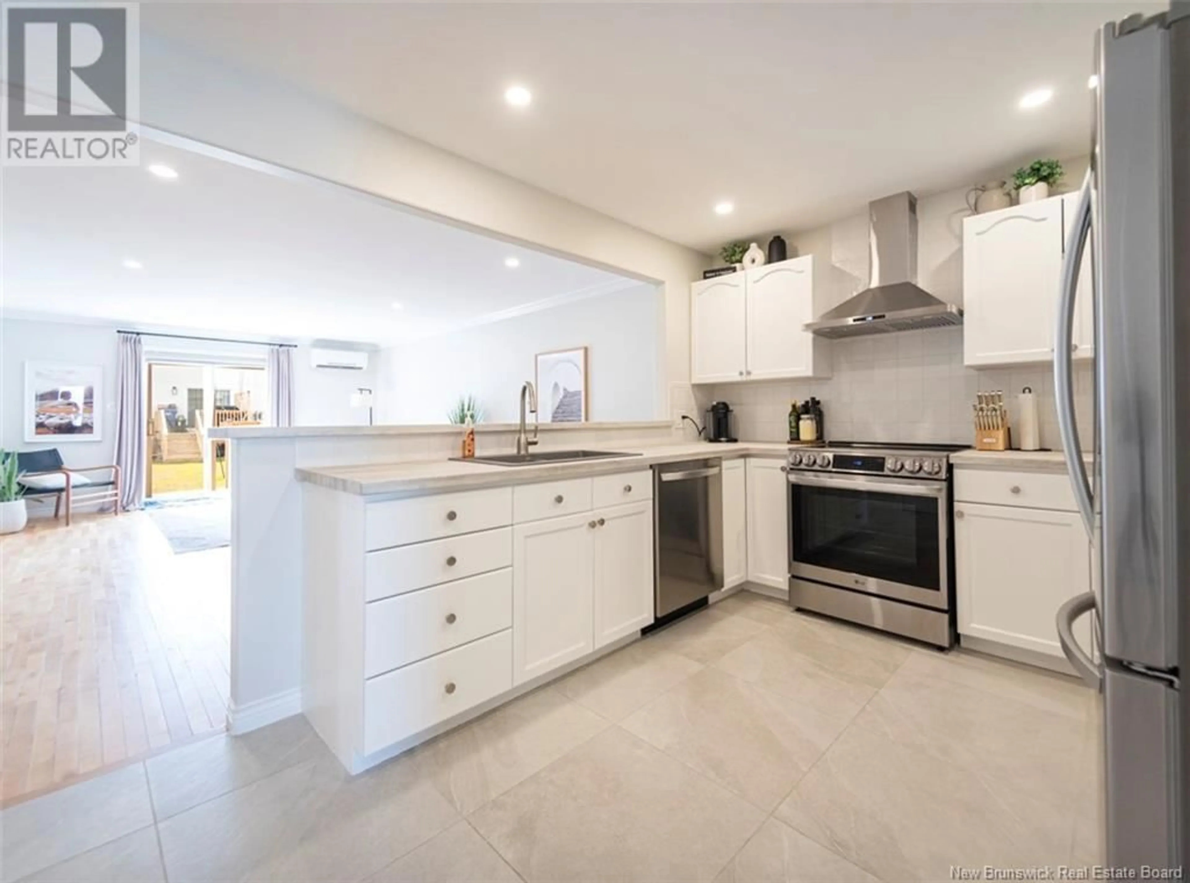 Open concept kitchen, ceramic/tile floor for 75 DOMETHILDE CRESCENT, Dieppe New Brunswick E1A8R4