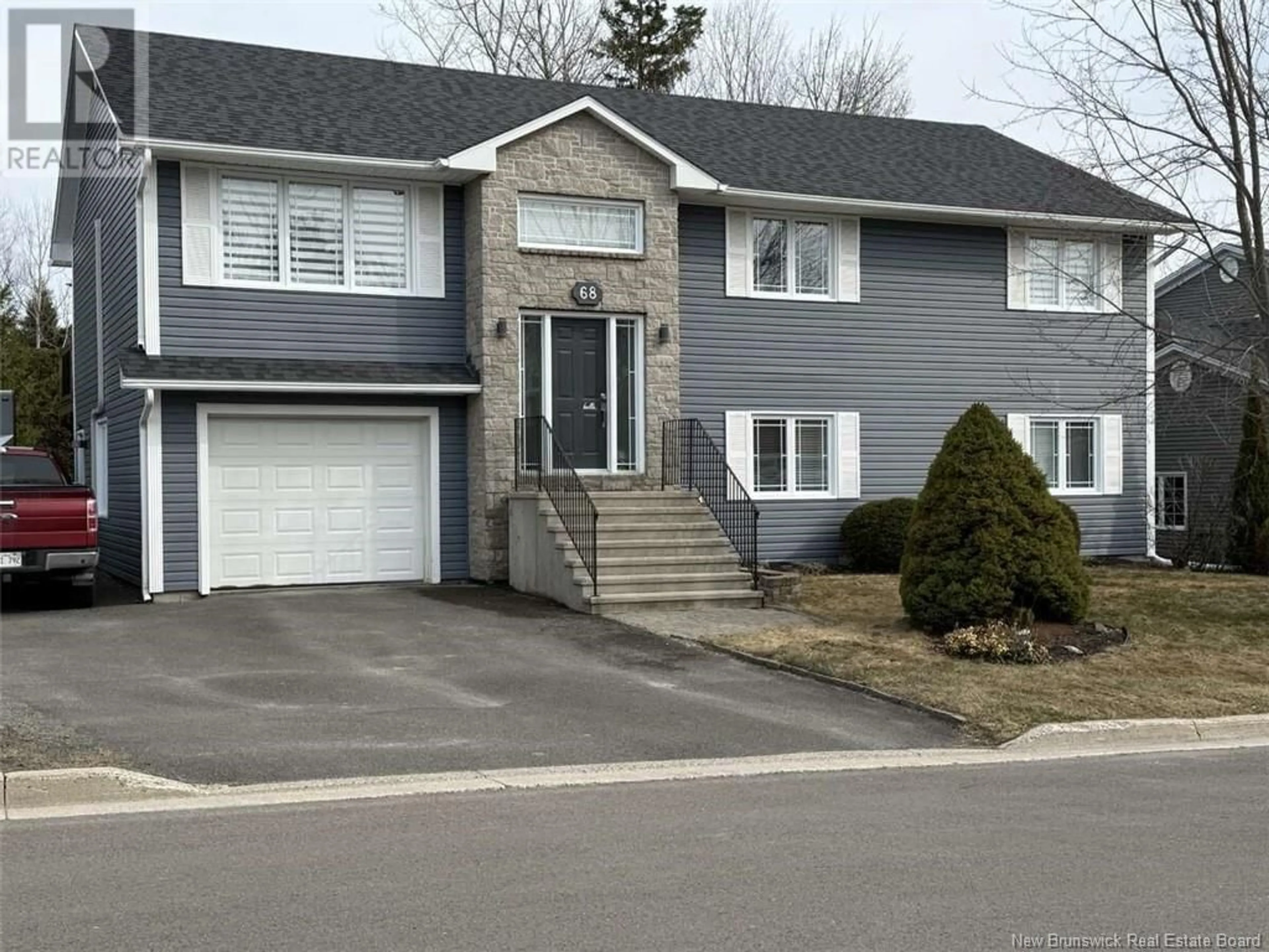 Home with vinyl exterior material, street for 68 ALEX STREET, Fredericton New Brunswick E3G0L1