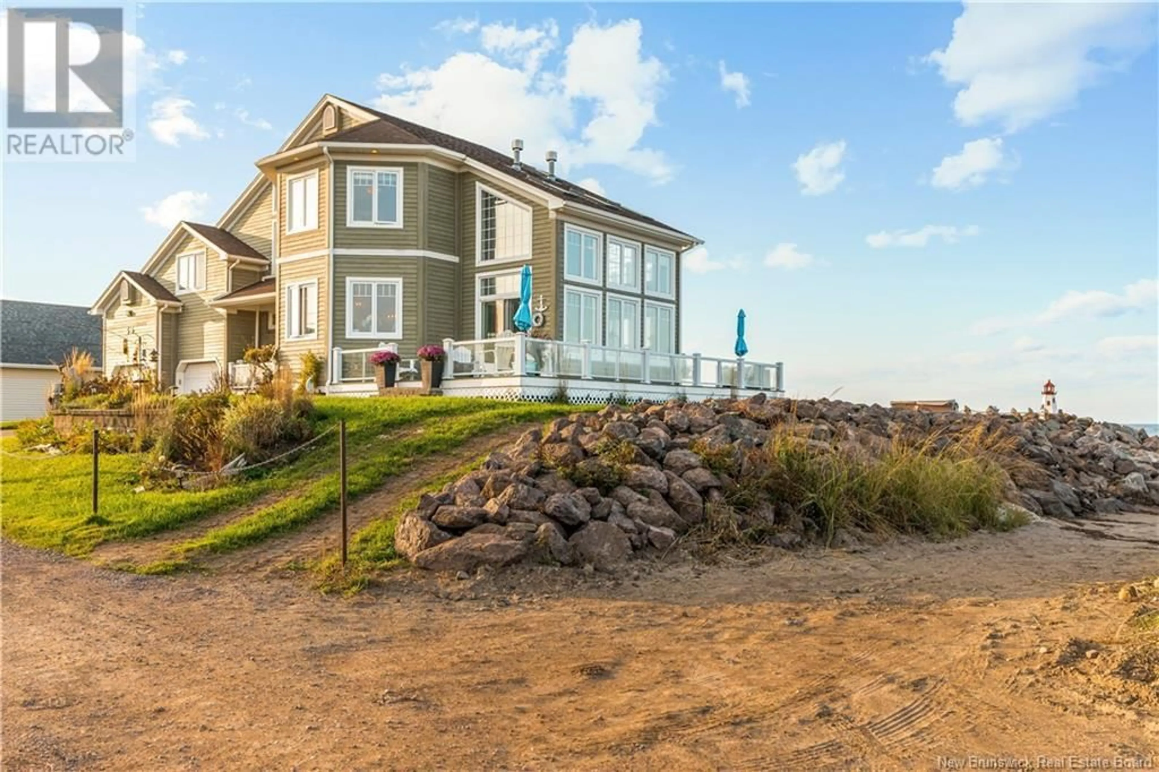 Home with vinyl exterior material, water/lake/river/ocean view for 56 SUR L'OCEAN STREET, Barachois New Brunswick E4P7Z9