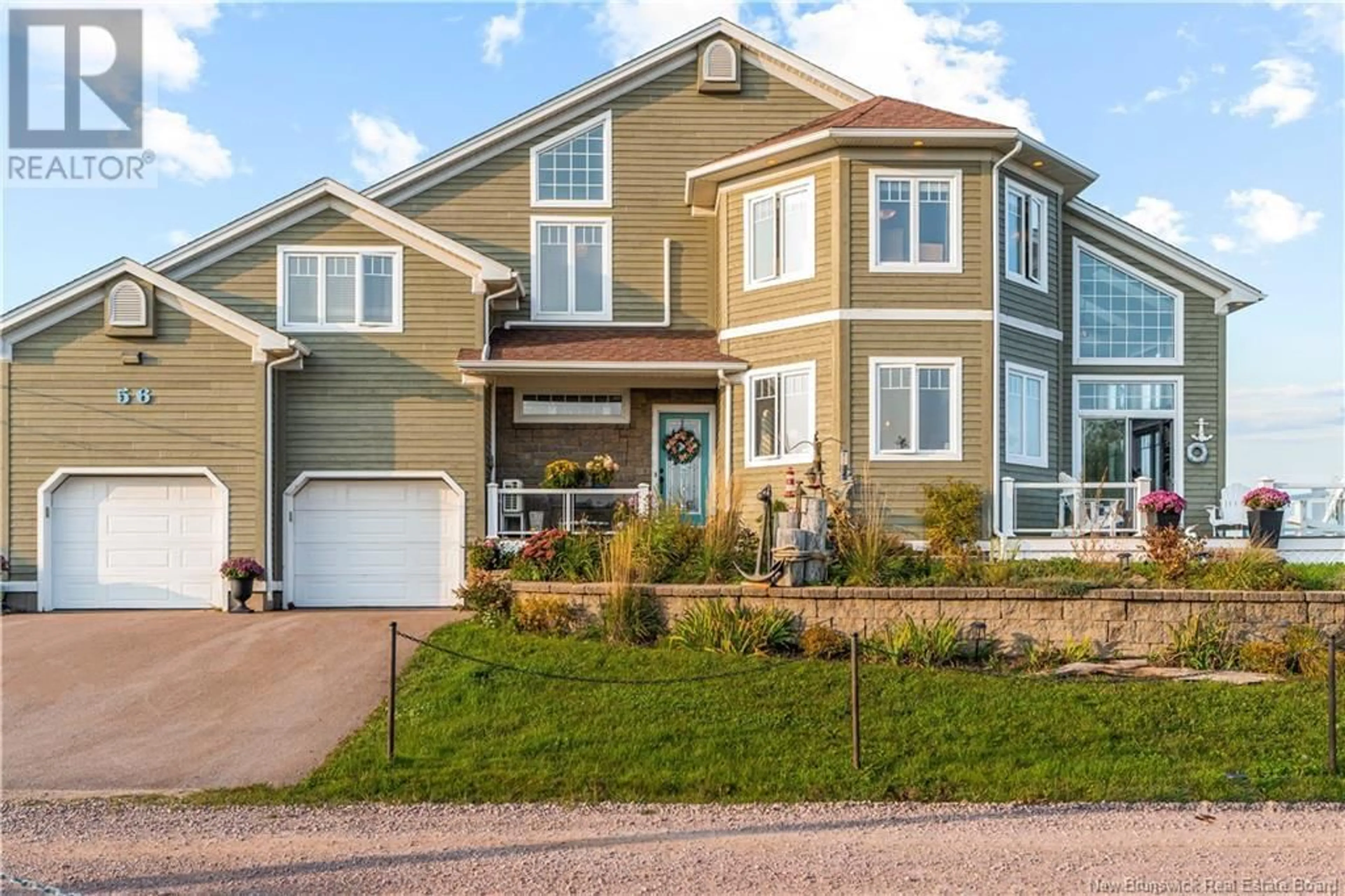 Home with vinyl exterior material, street for 56 SUR L'OCEAN STREET, Barachois New Brunswick E4P7Z9
