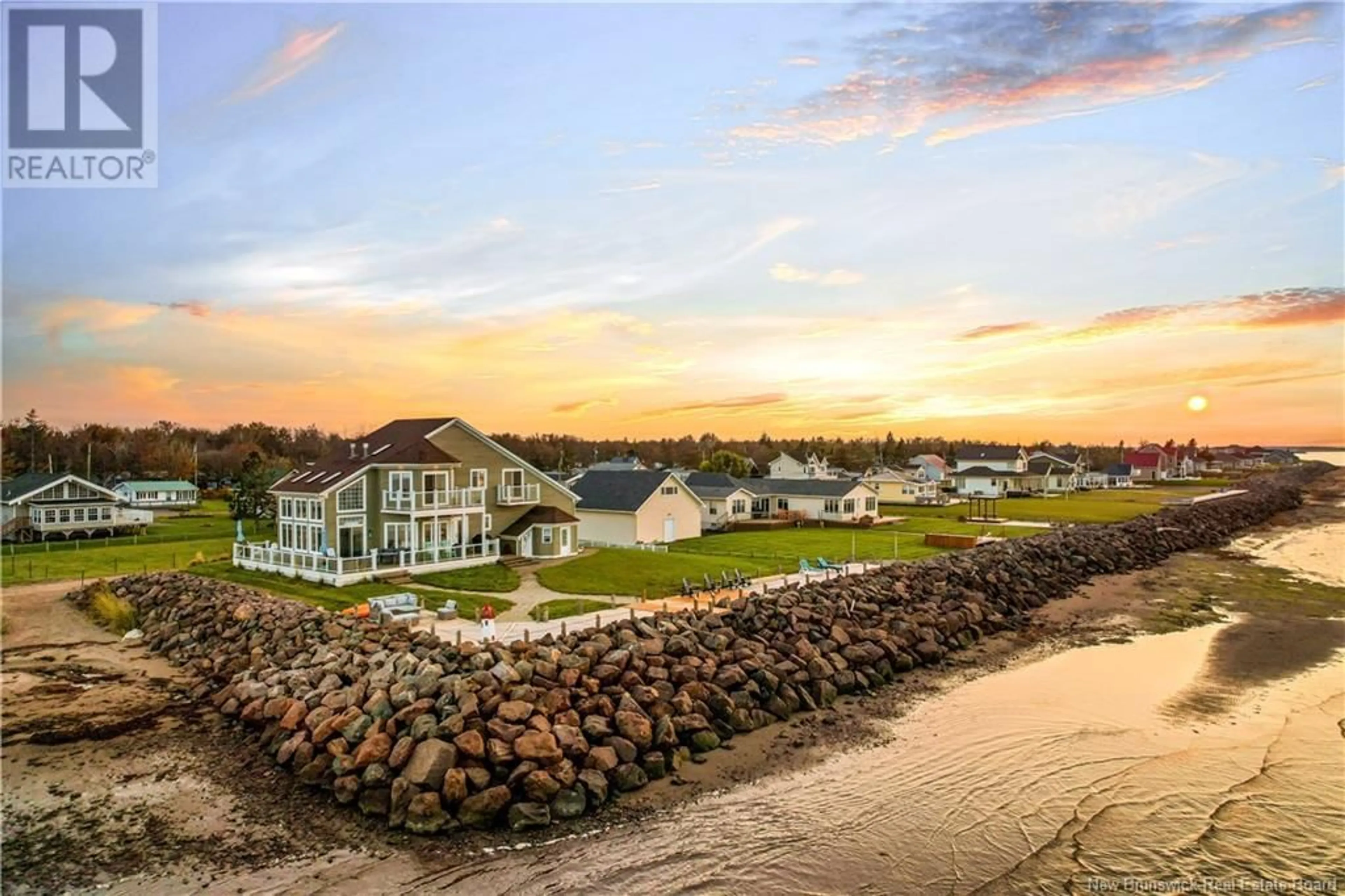 A pic from outside/outdoor area/front of a property/back of a property/a pic from drone, water/lake/river/ocean view for 56 SUR L'OCEAN STREET, Barachois New Brunswick E4P7Z9