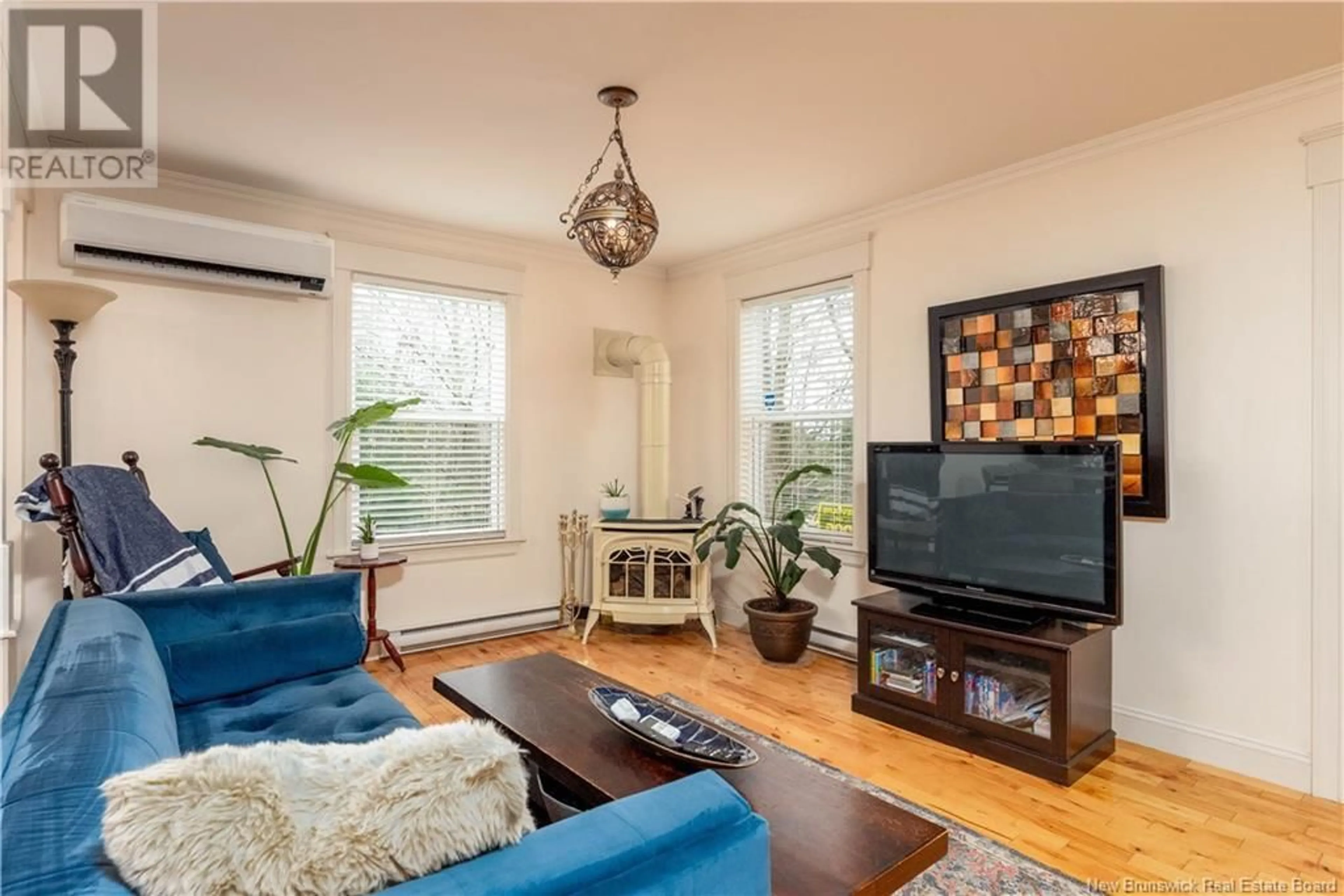 Living room with furniture, wood/laminate floor for 466 DOVER ROAD, Dieppe New Brunswick E1A7L6