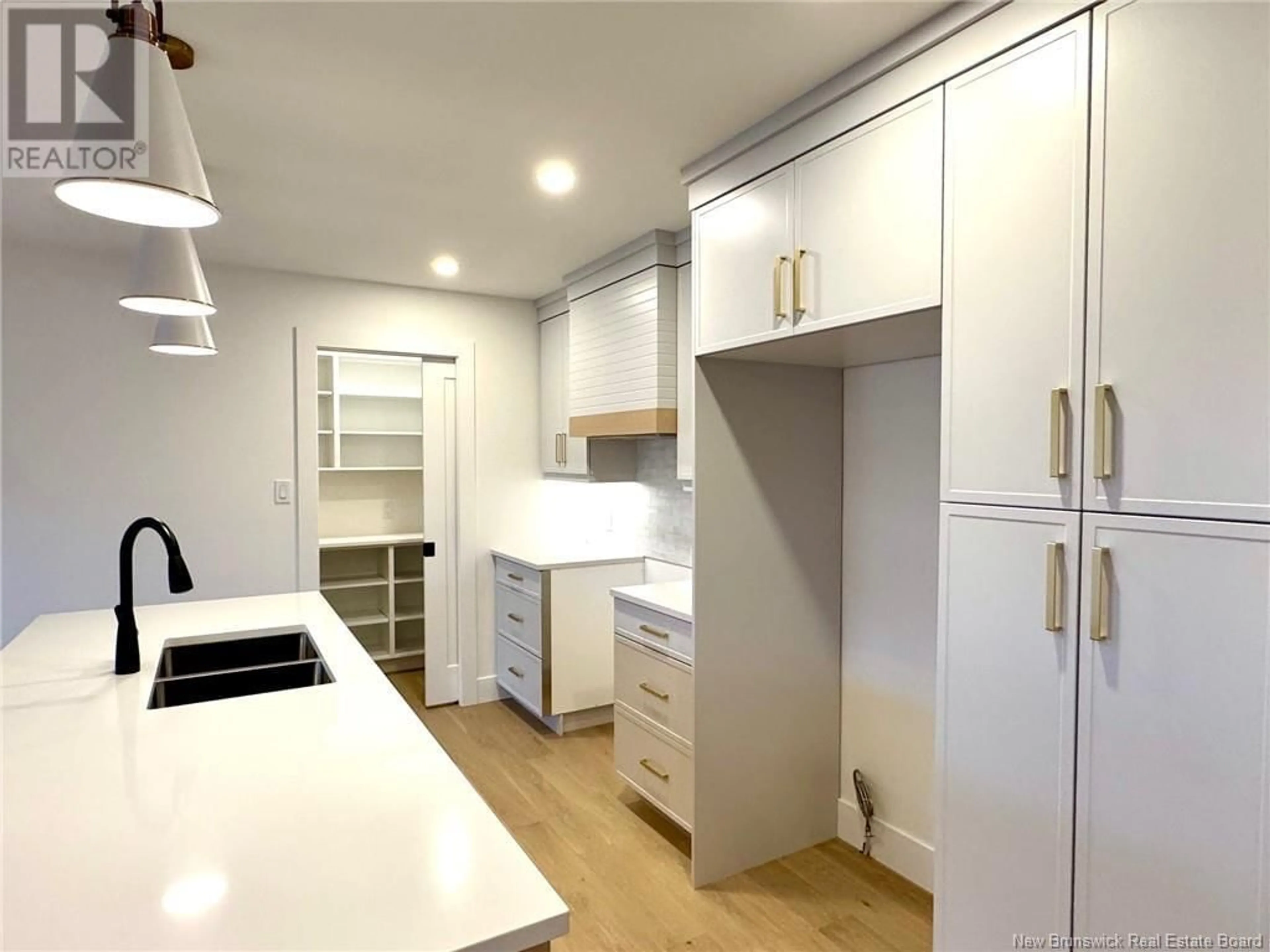 Open concept kitchen, wood/laminate floor for 75 ROSENBURG STREET, Moncton New Brunswick E1G6E9