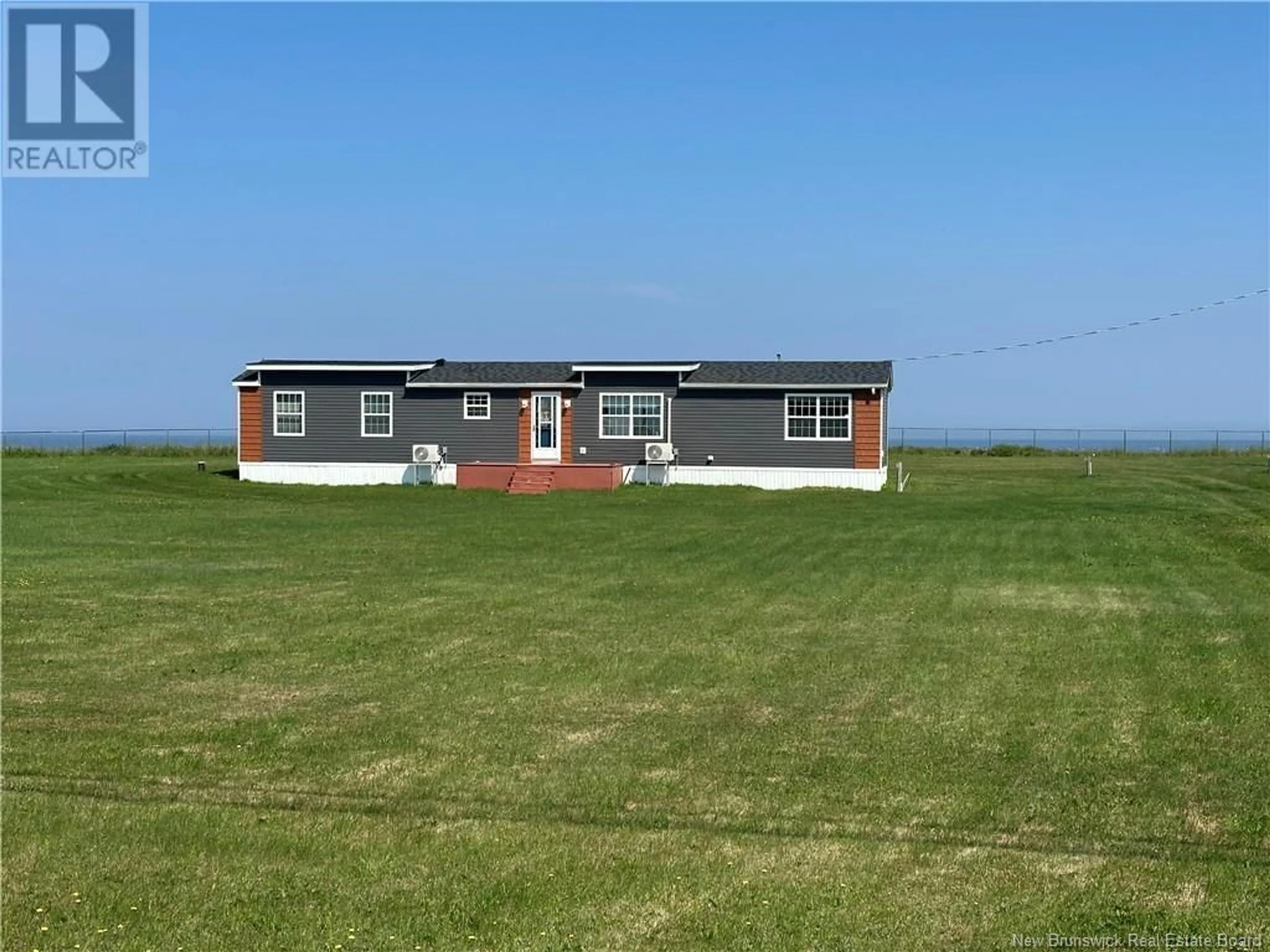 A pic from outside/outdoor area/front of a property/back of a property/a pic from drone, unknown for 493 RUE ACADIE STREET, Grande-Anse New Brunswick E8N1C6