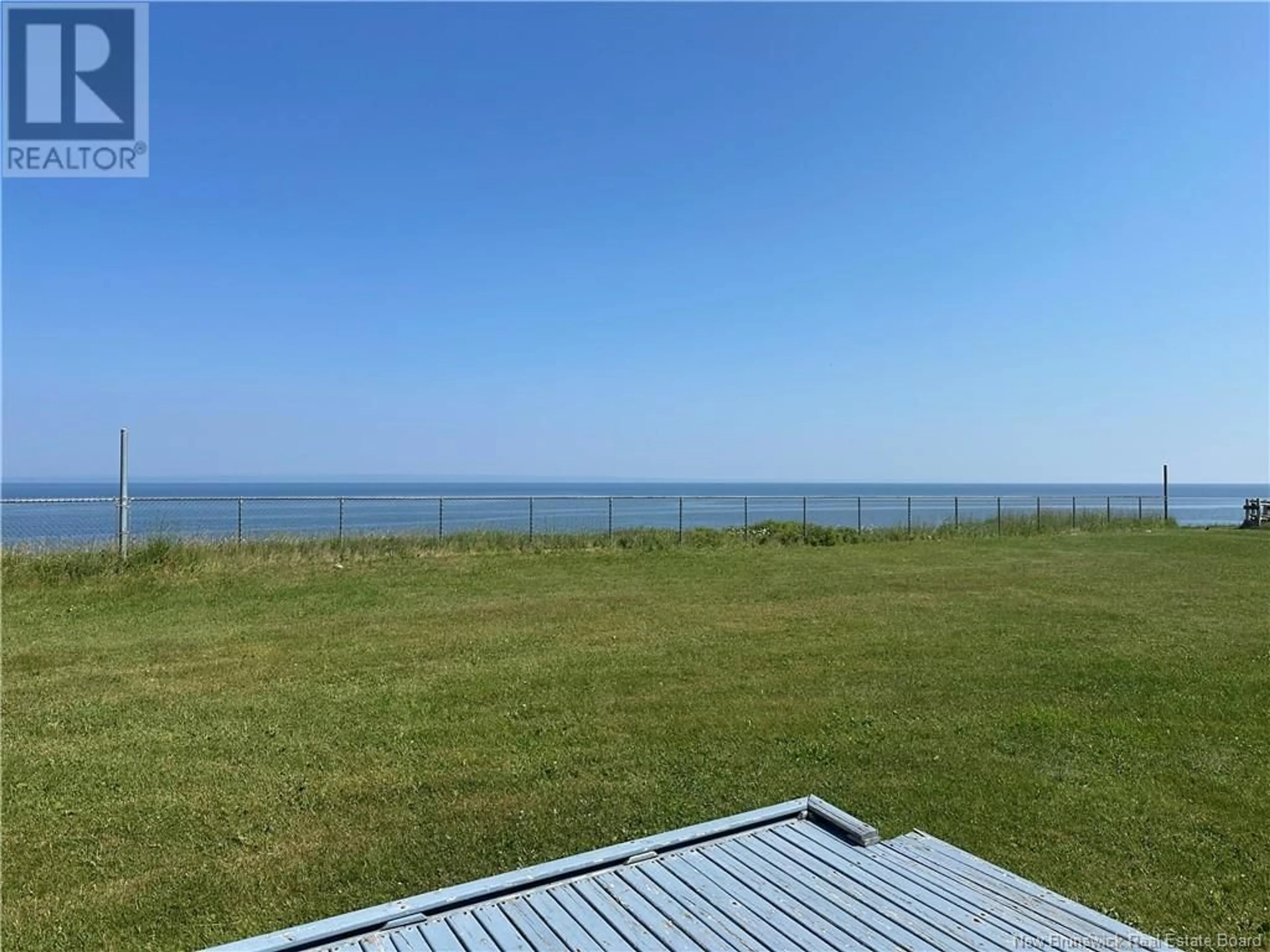 A pic from outside/outdoor area/front of a property/back of a property/a pic from drone, water/lake/river/ocean view for 493 RUE ACADIE STREET, Grande-Anse New Brunswick E8N1C6