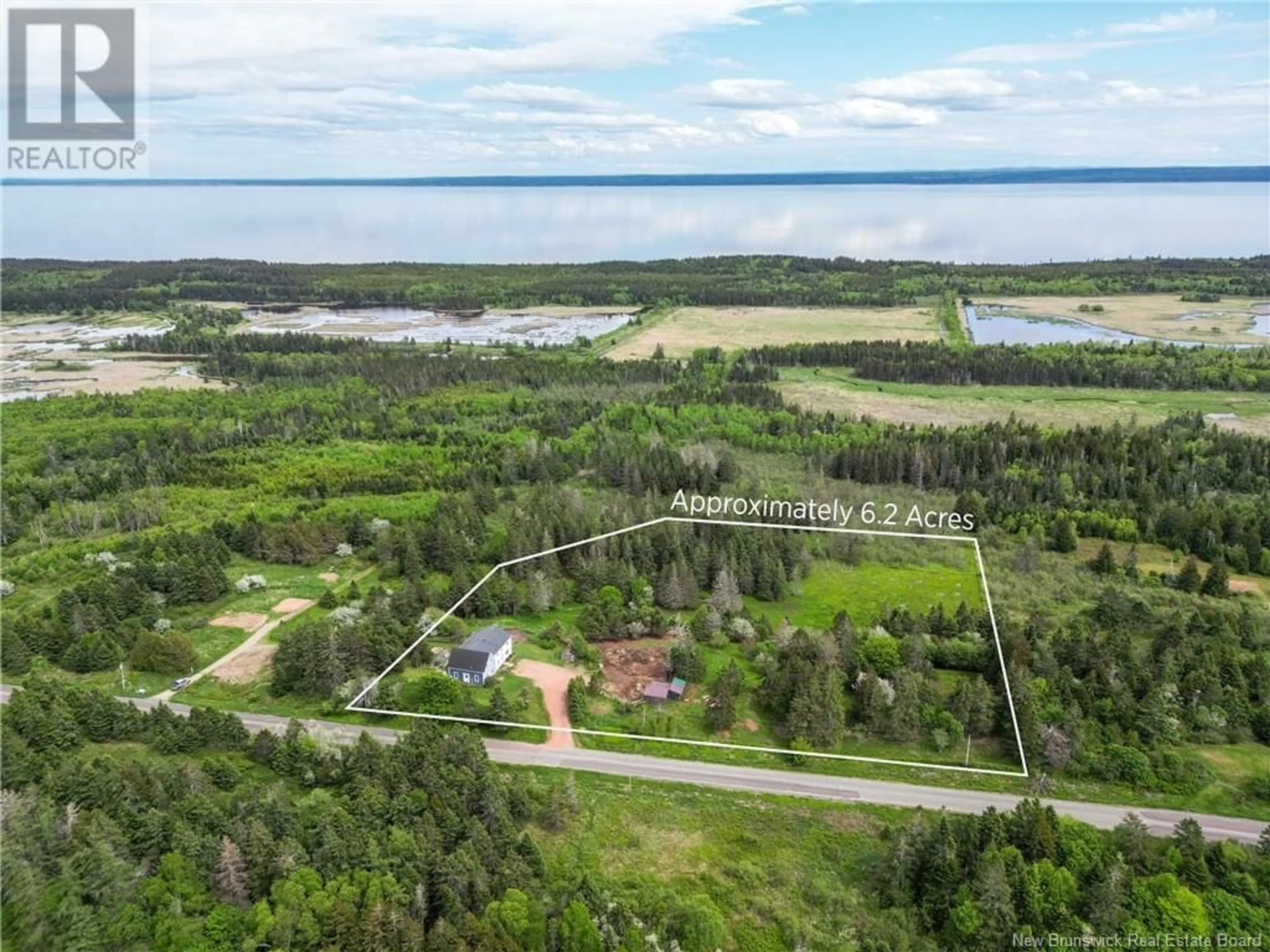 A pic from outside/outdoor area/front of a property/back of a property/a pic from drone, water/lake/river/ocean view for 899 ROUTE 915, New Horton New Brunswick E4H3S9