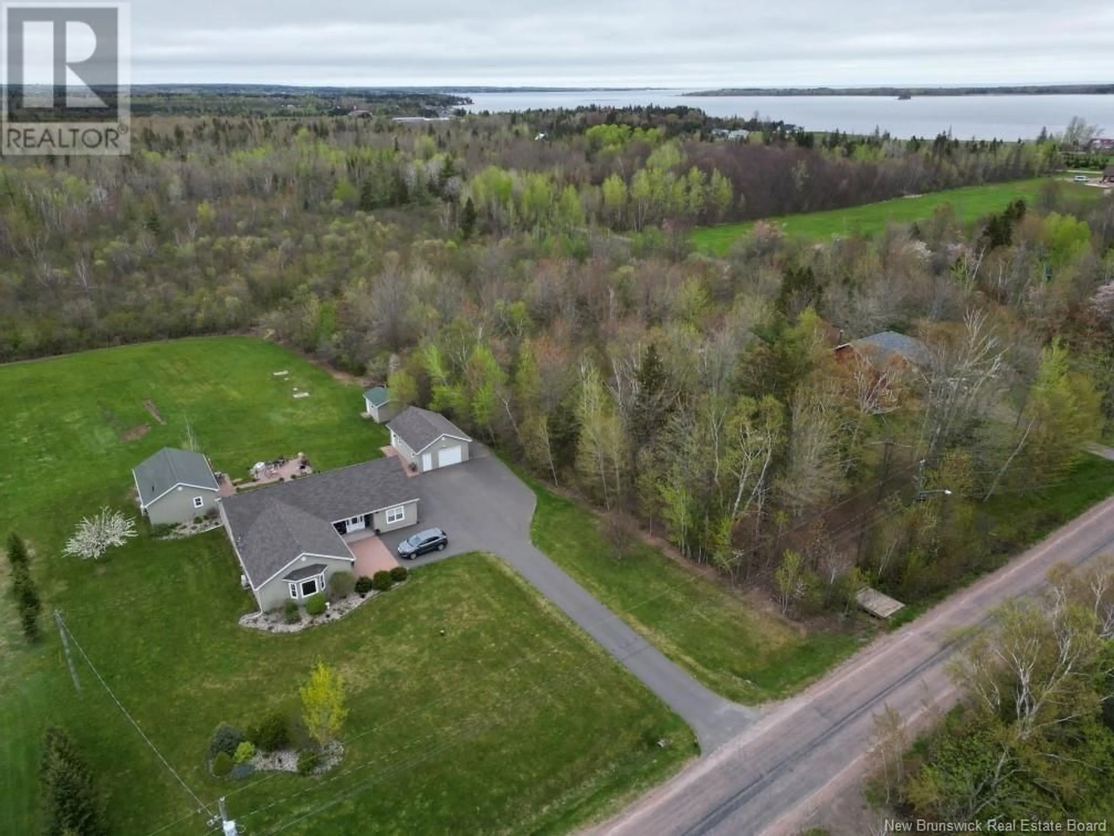 A pic from outside/outdoor area/front of a property/back of a property/a pic from drone, water/lake/river/ocean view for 45 OLD MILL ROAD, Shediac Cape New Brunswick E4P3C4