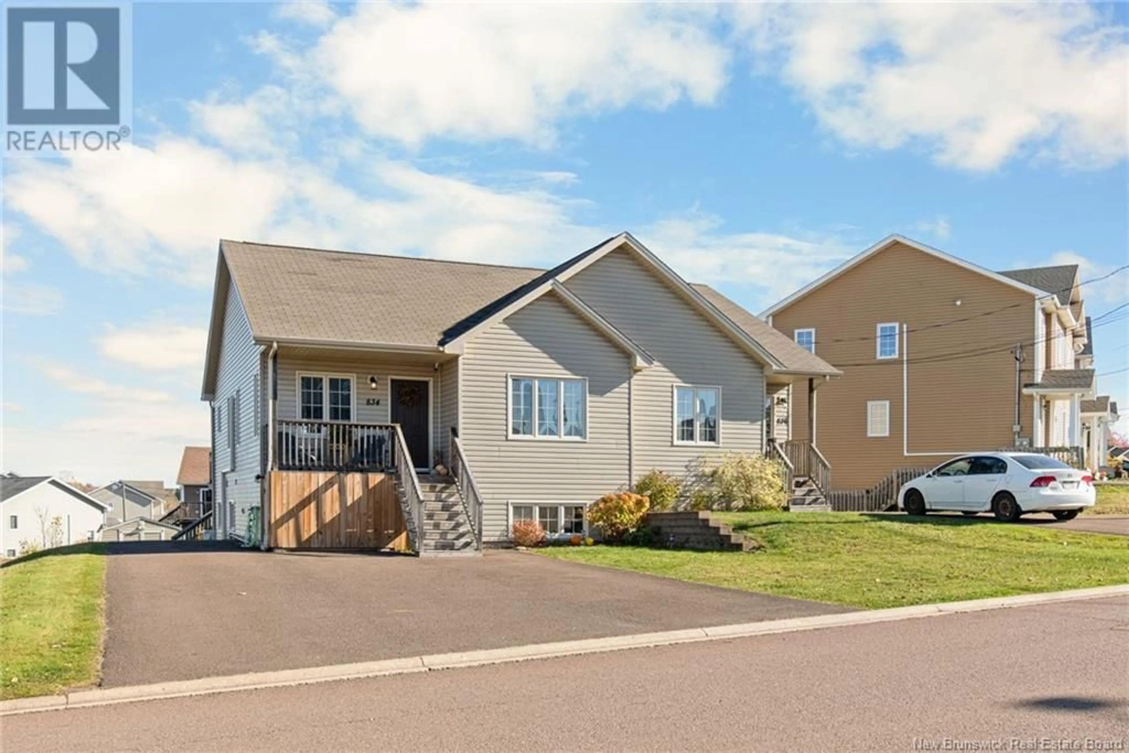 Home with vinyl exterior material, street for 834 BERNARD STREET, Dieppe New Brunswick E1A5A4