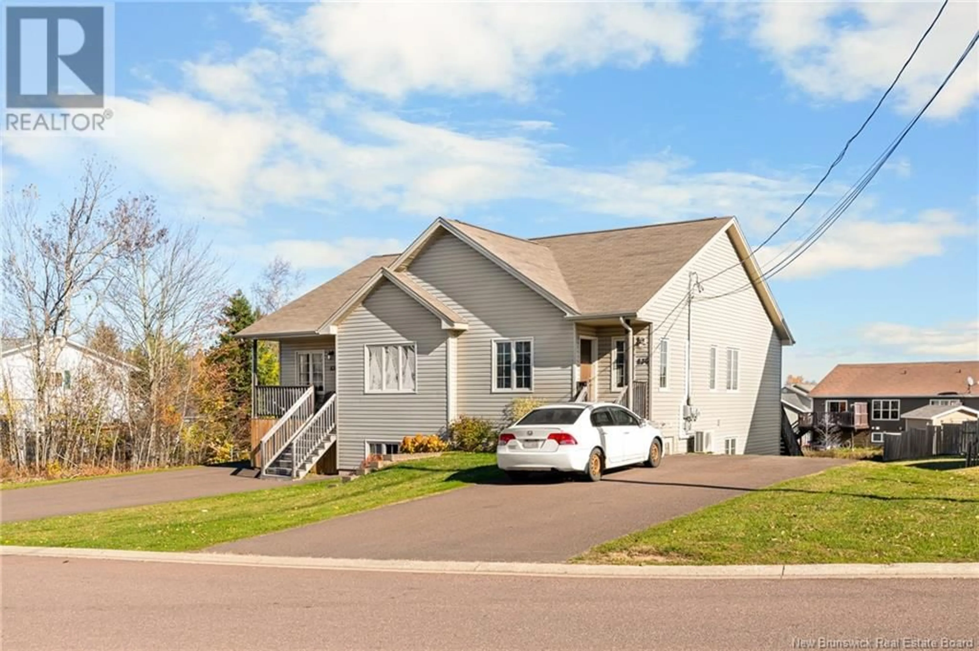 Home with vinyl exterior material, street for 836 BERNARD STREET, Dieppe New Brunswick E1A5A4