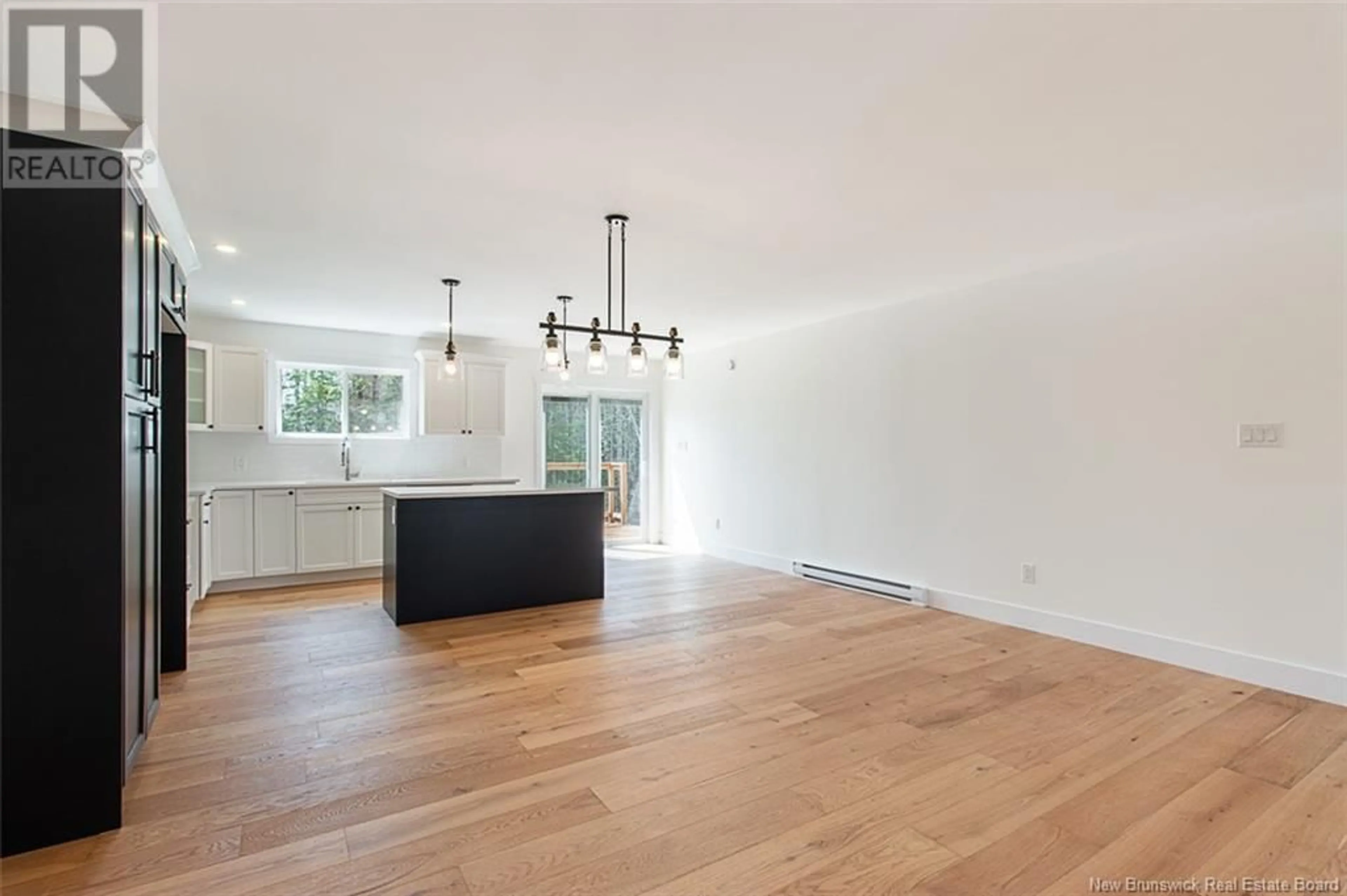 Open concept kitchen, wood/laminate floor for 36 MILLER AVENUE, Salisbury New Brunswick E4J2N1