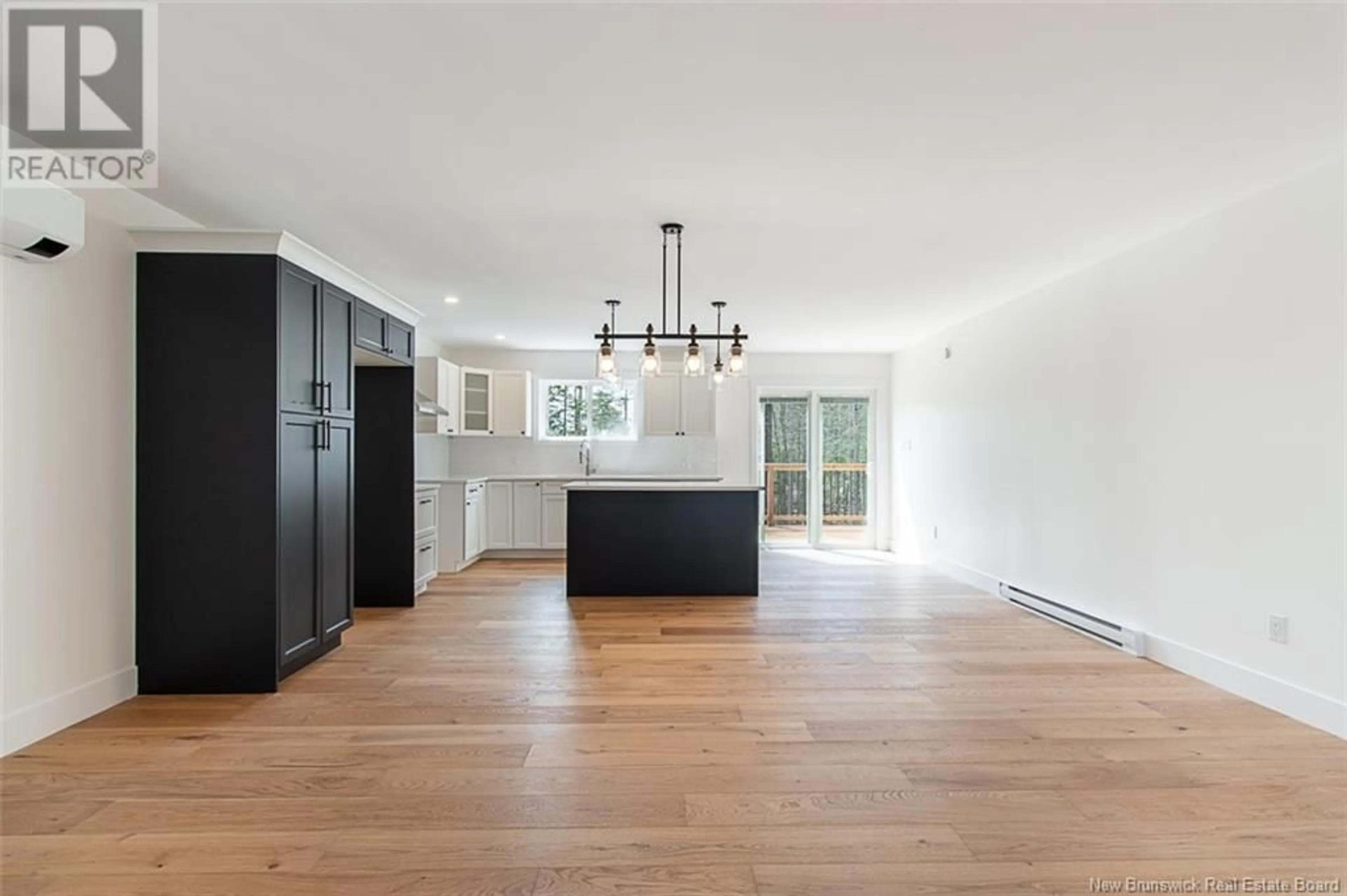 Open concept kitchen, wood/laminate floor for 36 MILLER AVENUE, Salisbury New Brunswick E4J2N1