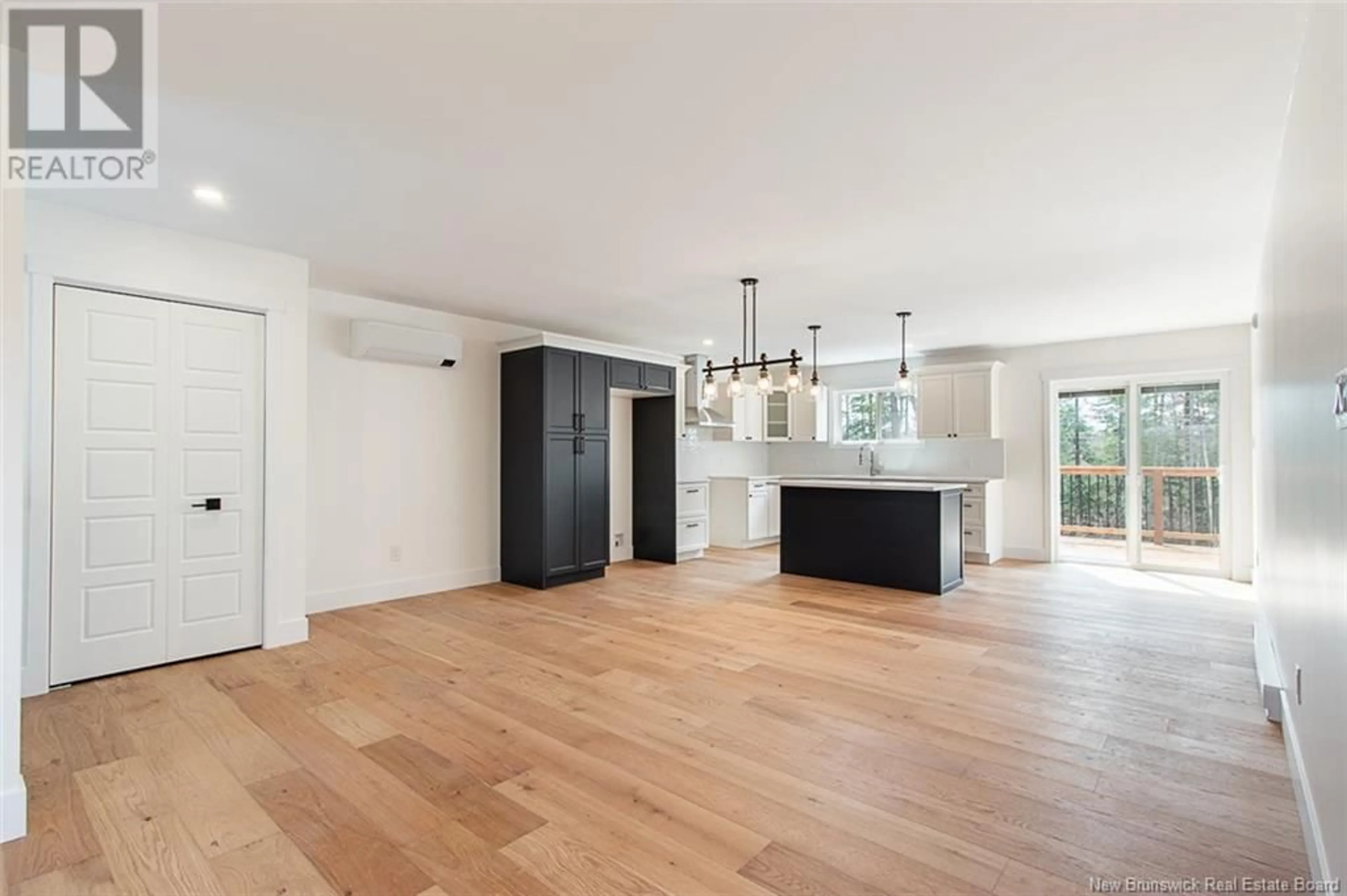 Open concept kitchen, wood/laminate floor for 36 MILLER AVENUE, Salisbury New Brunswick E4J2N1