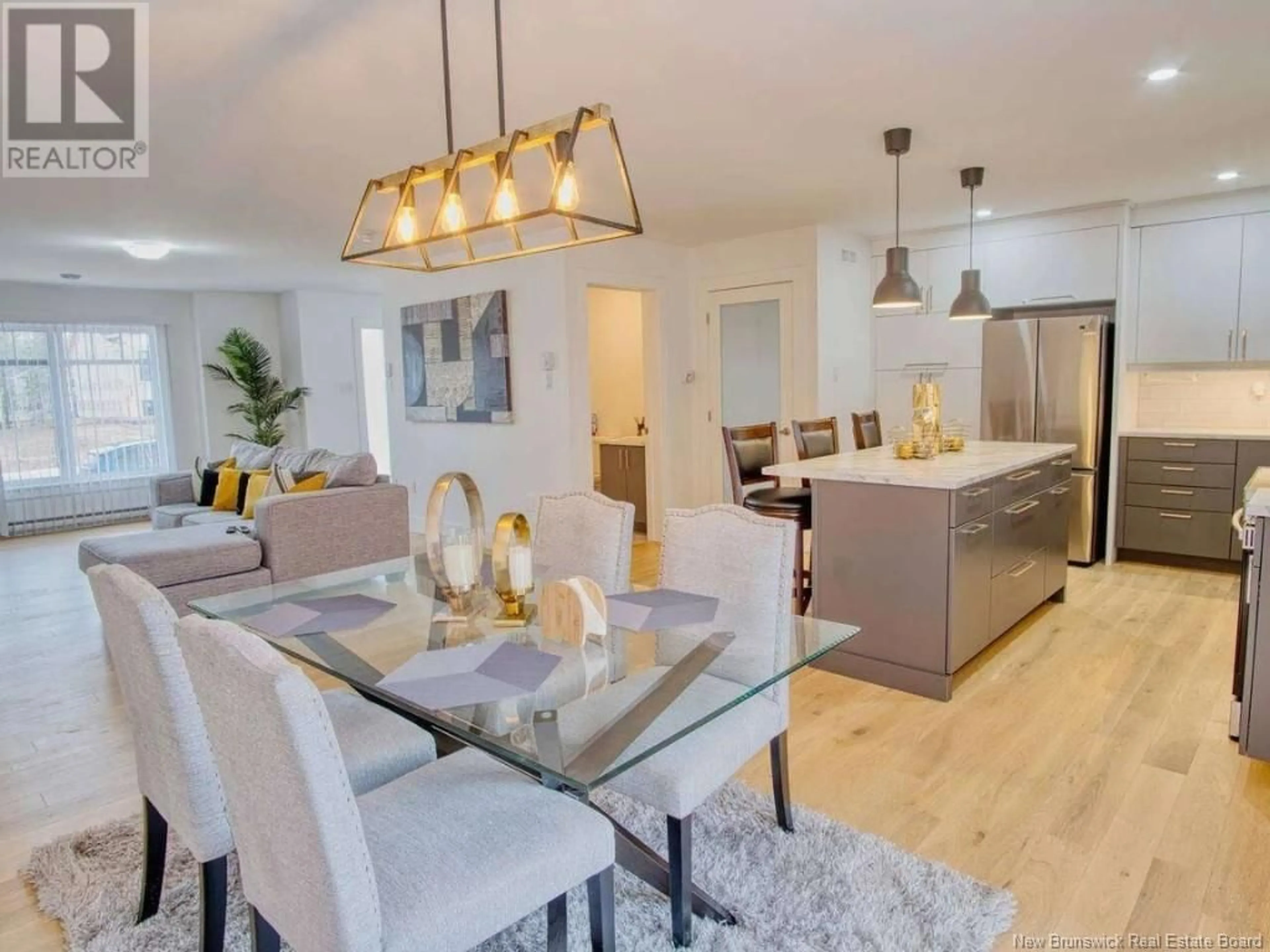 Open concept kitchen, wood/laminate floor for 116 NEWCOMBE DRIVE, Moncton New Brunswick E1A9V4