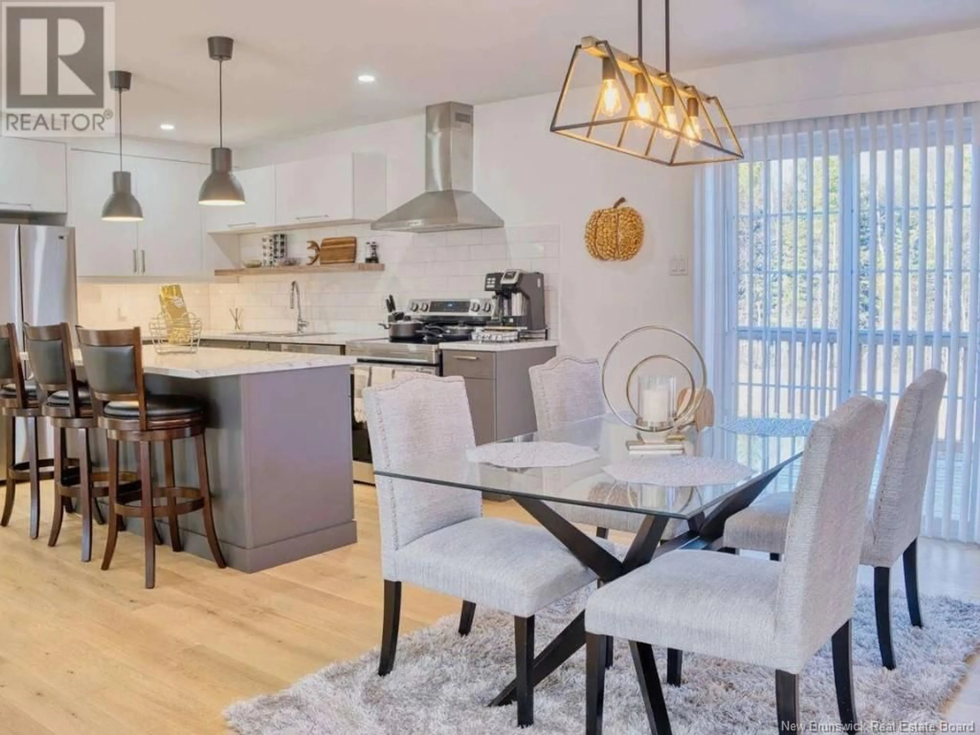 Open concept kitchen, wood/laminate floor for 116 NEWCOMBE DRIVE, Moncton New Brunswick E1A9V4