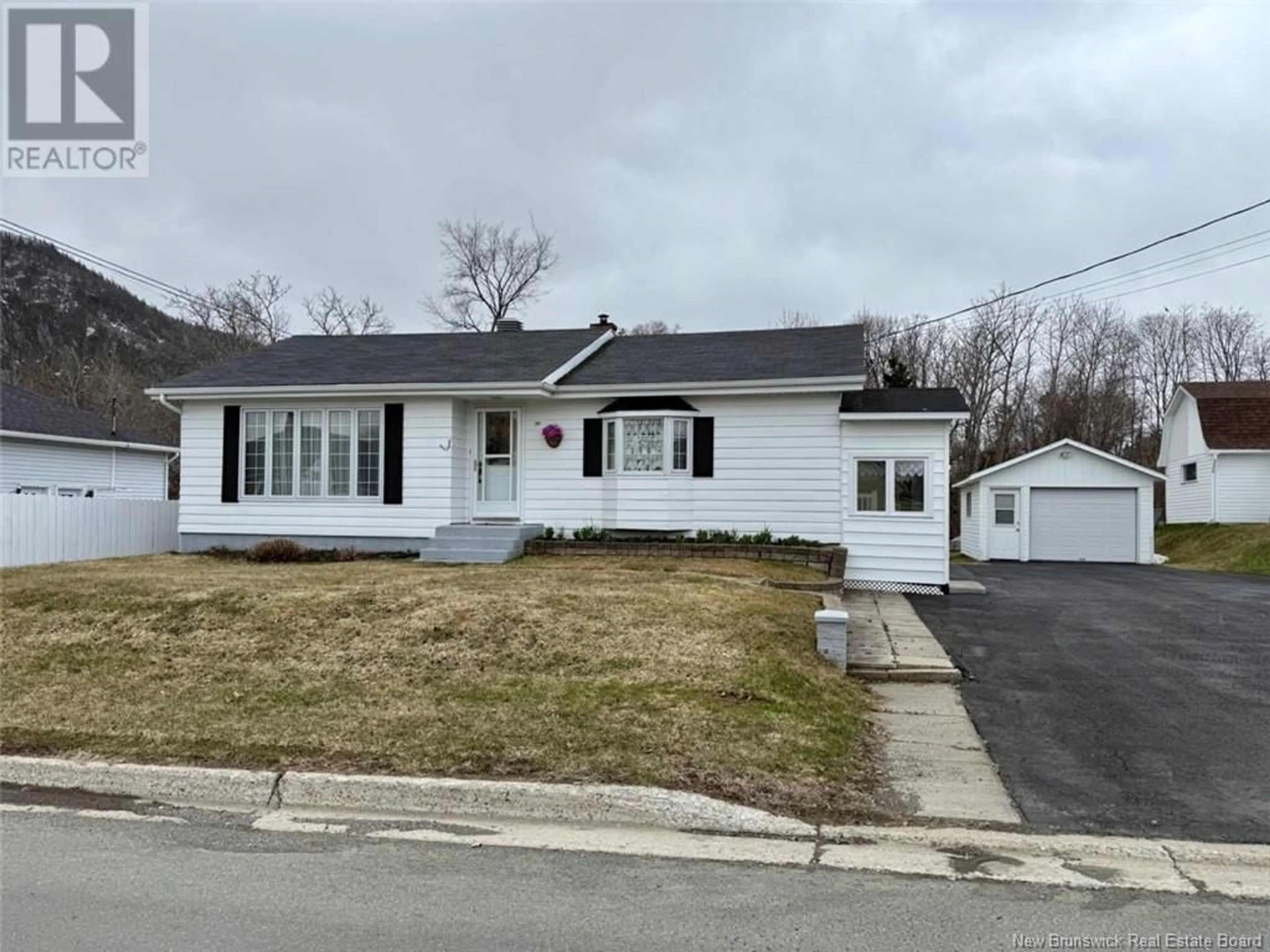 Home with vinyl exterior material, street for 59 GEORGE STREET, Campbellton New Brunswick E3N3A4