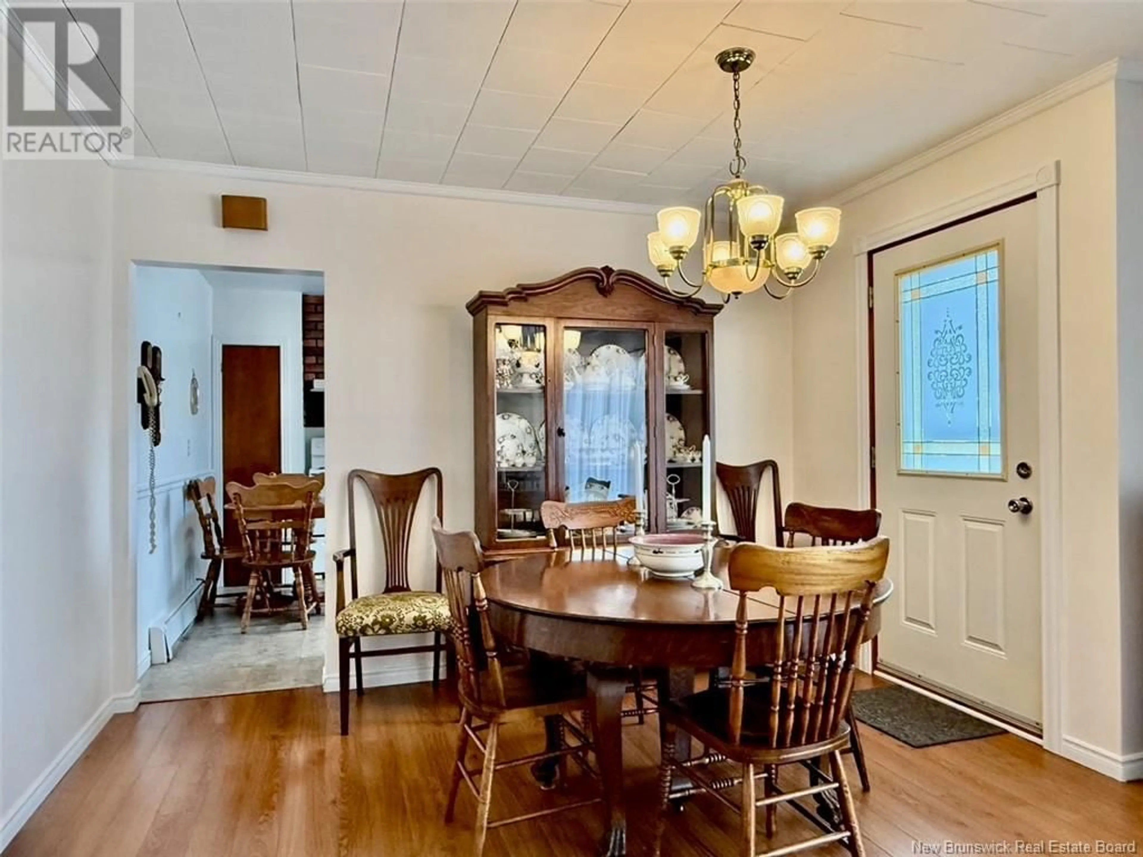 Dining room, wood/laminate floor for 59 GEORGE STREET, Campbellton New Brunswick E3N3A4