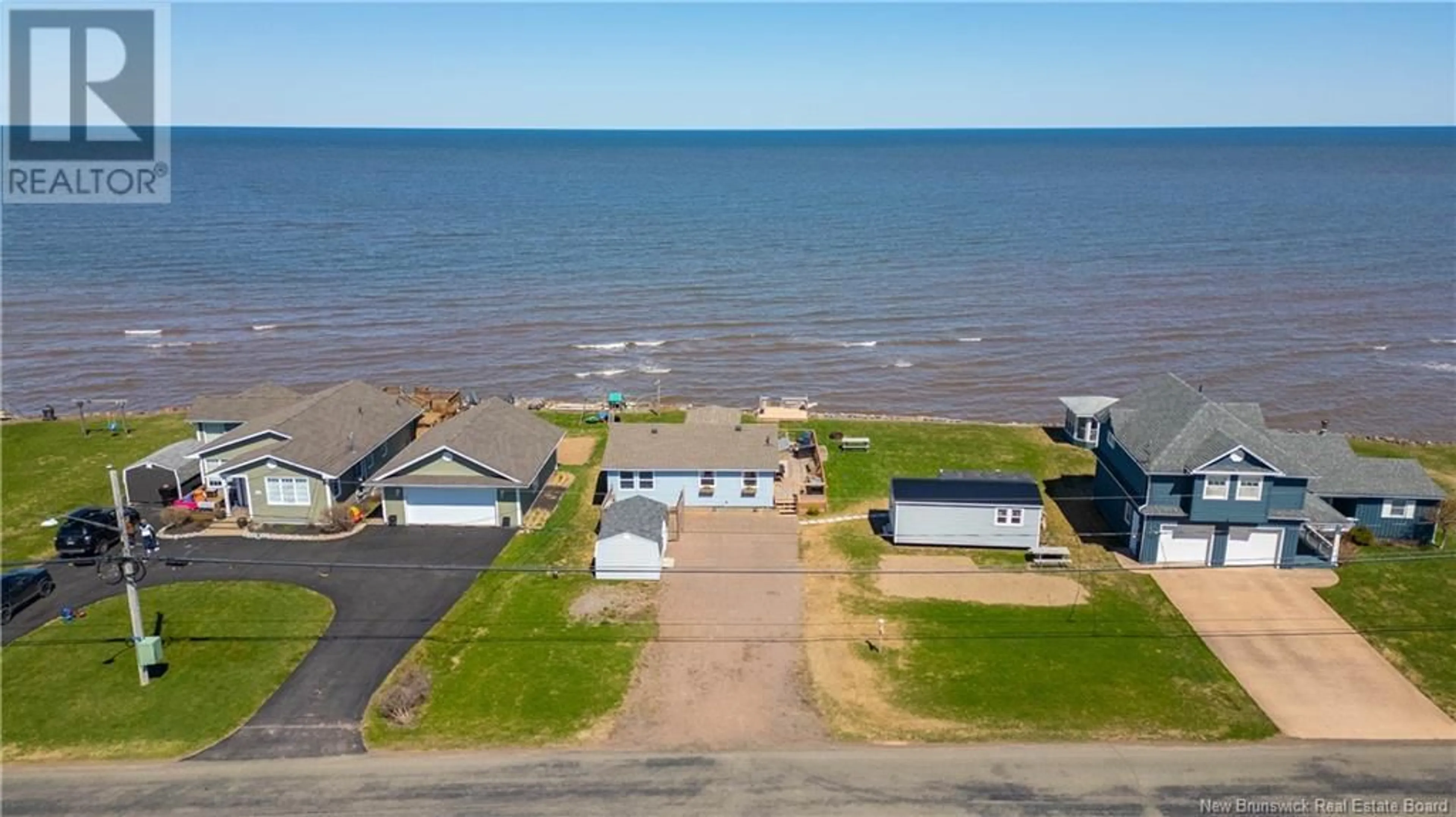 A pic from outside/outdoor area/front of a property/back of a property/a pic from drone, water/lake/river/ocean view for 298 CHEMIN DE LA COTE, Grande-Digue New Brunswick E4R4C3